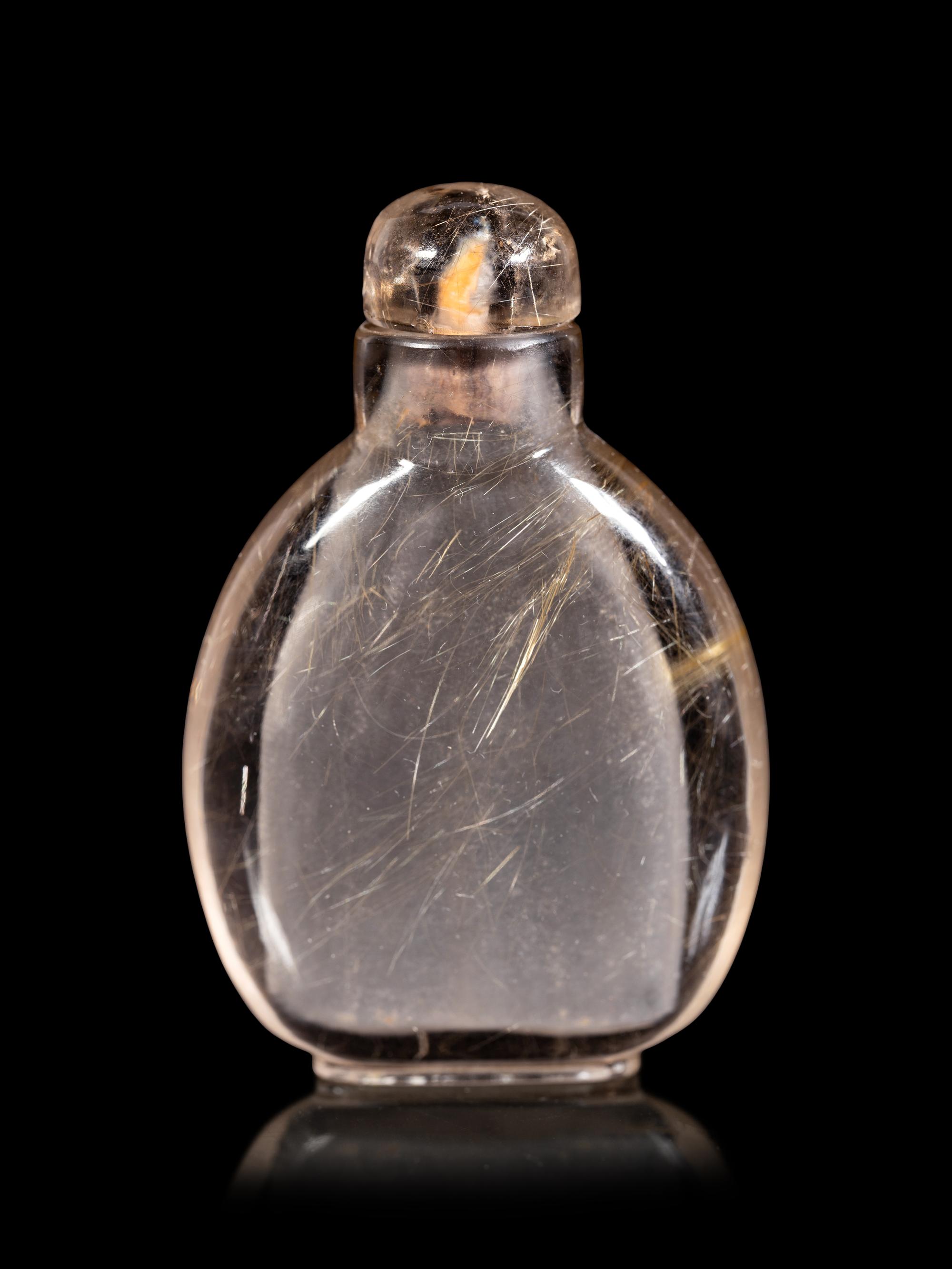 Two Carved Quartz Snuff Bottles
