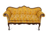 A Louis XV Provincial Carved Walnut Settee