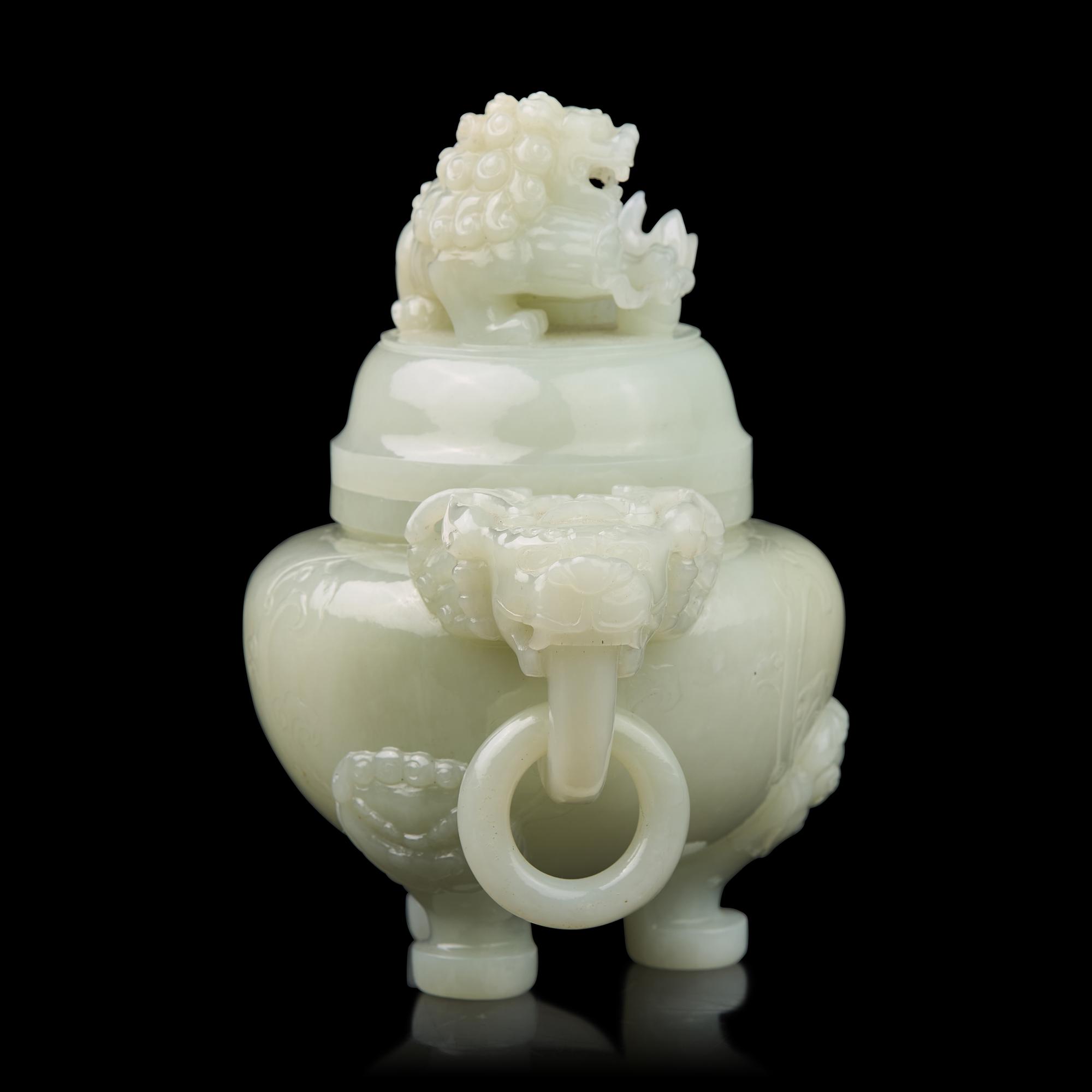 A Chinese White Jade Tripod Censer and Cover, 20th Century 近代 白玉活環耳三足爐