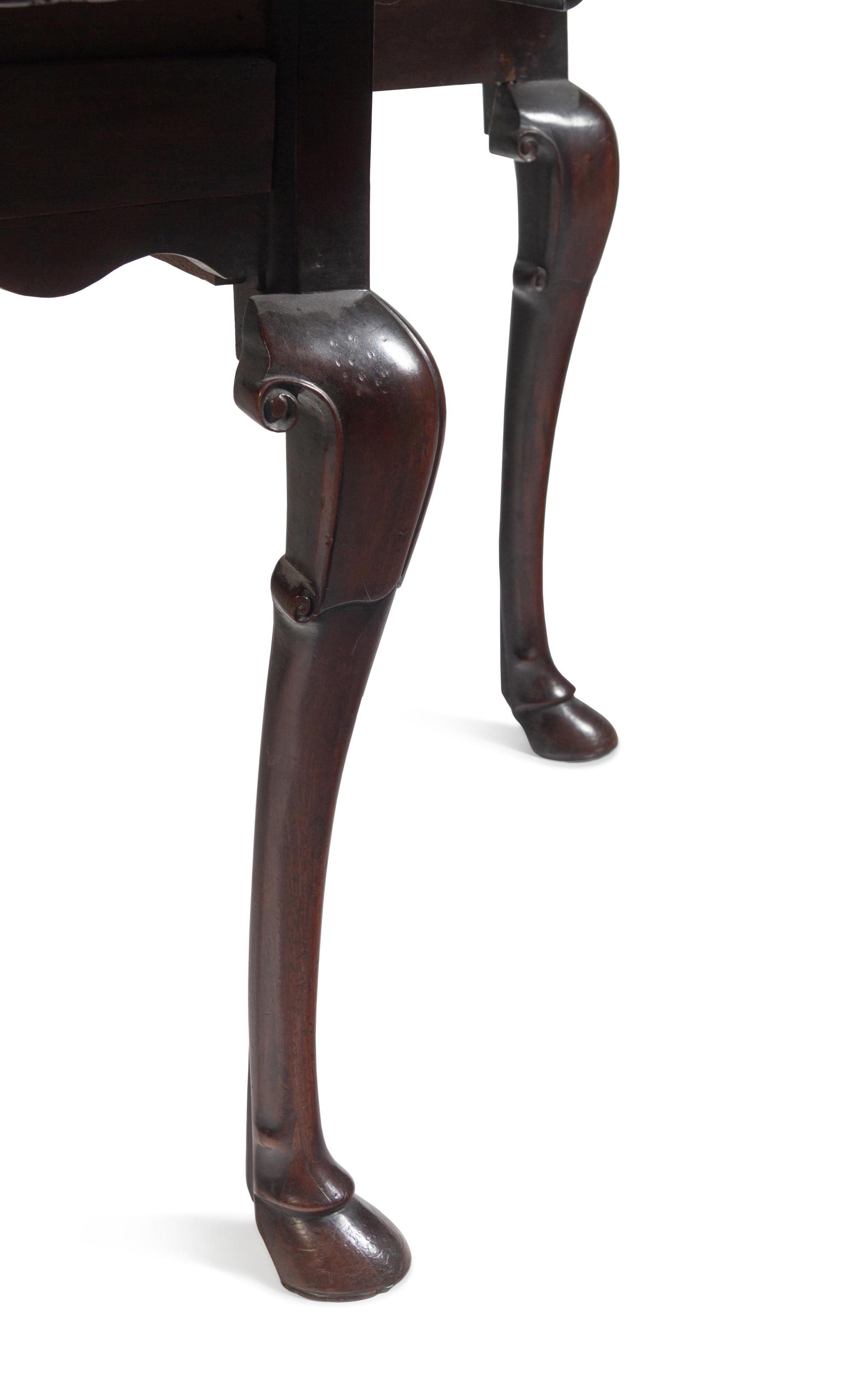 A George III Mahogany Drop-Leaf Table