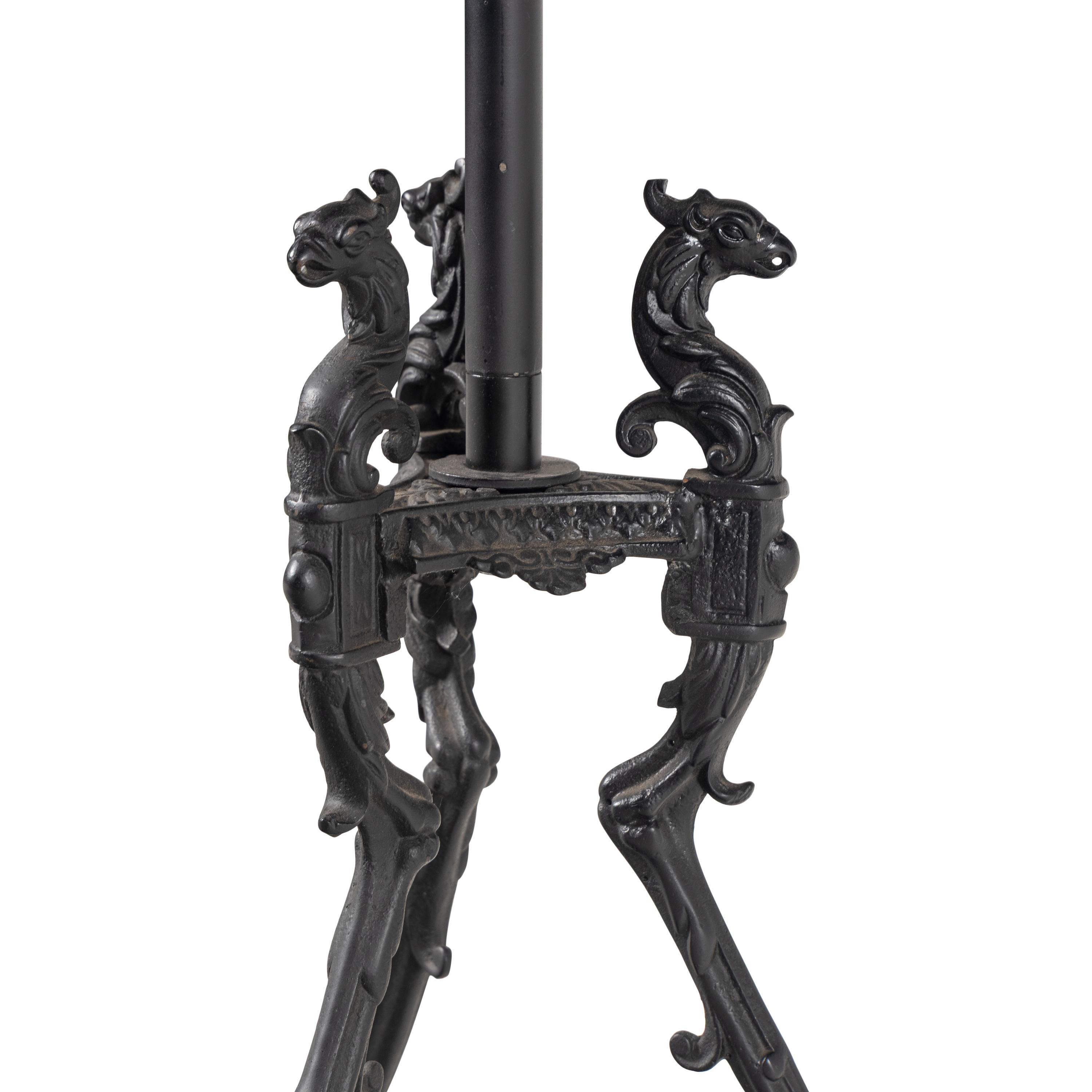 A Pair of Neoclassical Iron Onyx-Top Tables