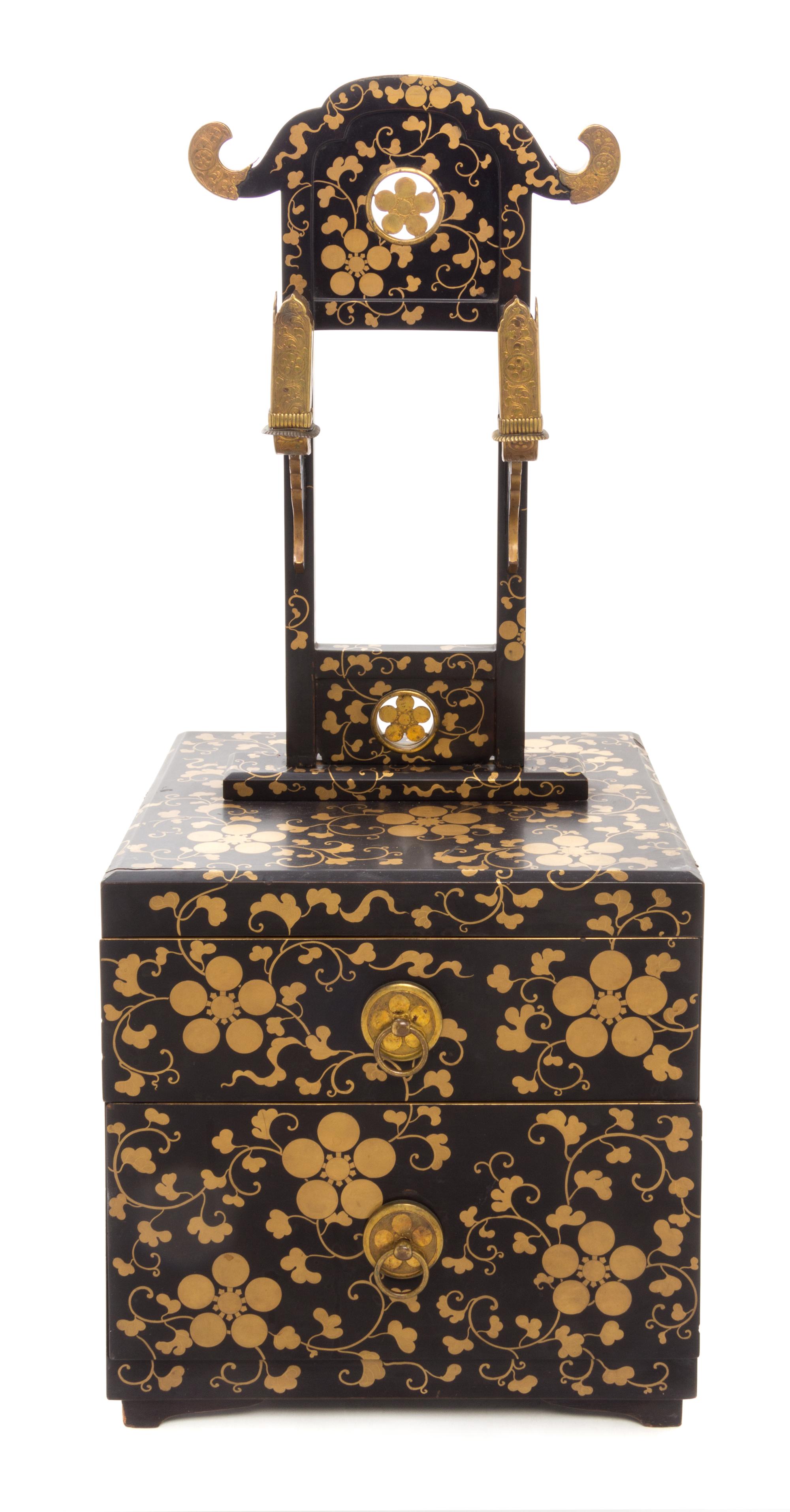 A Japanese Gilt and Black Lacquer Mirror Stand Height 25 1/2 x width 10 3/4 x depth 10 7/8 inches.
