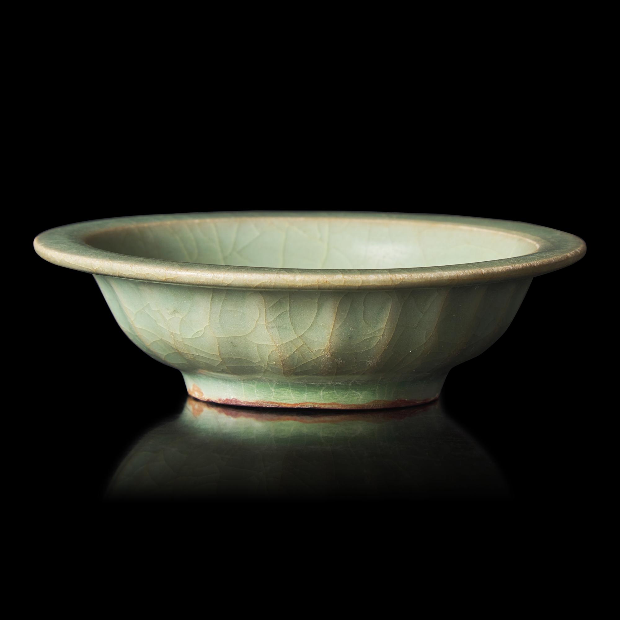A Chinese Longquan Celadon 'Twin-Fish' Bowl, Southern Song Dynasty 南宋 龍泉雙魚洗