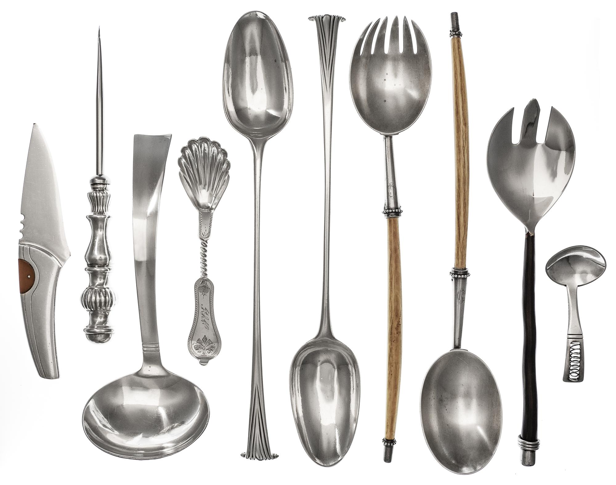 A Collection of Silver and Silver Plate Serving Articles, various makers, comprising two Georgian silver Onslow pattern serving spoons,