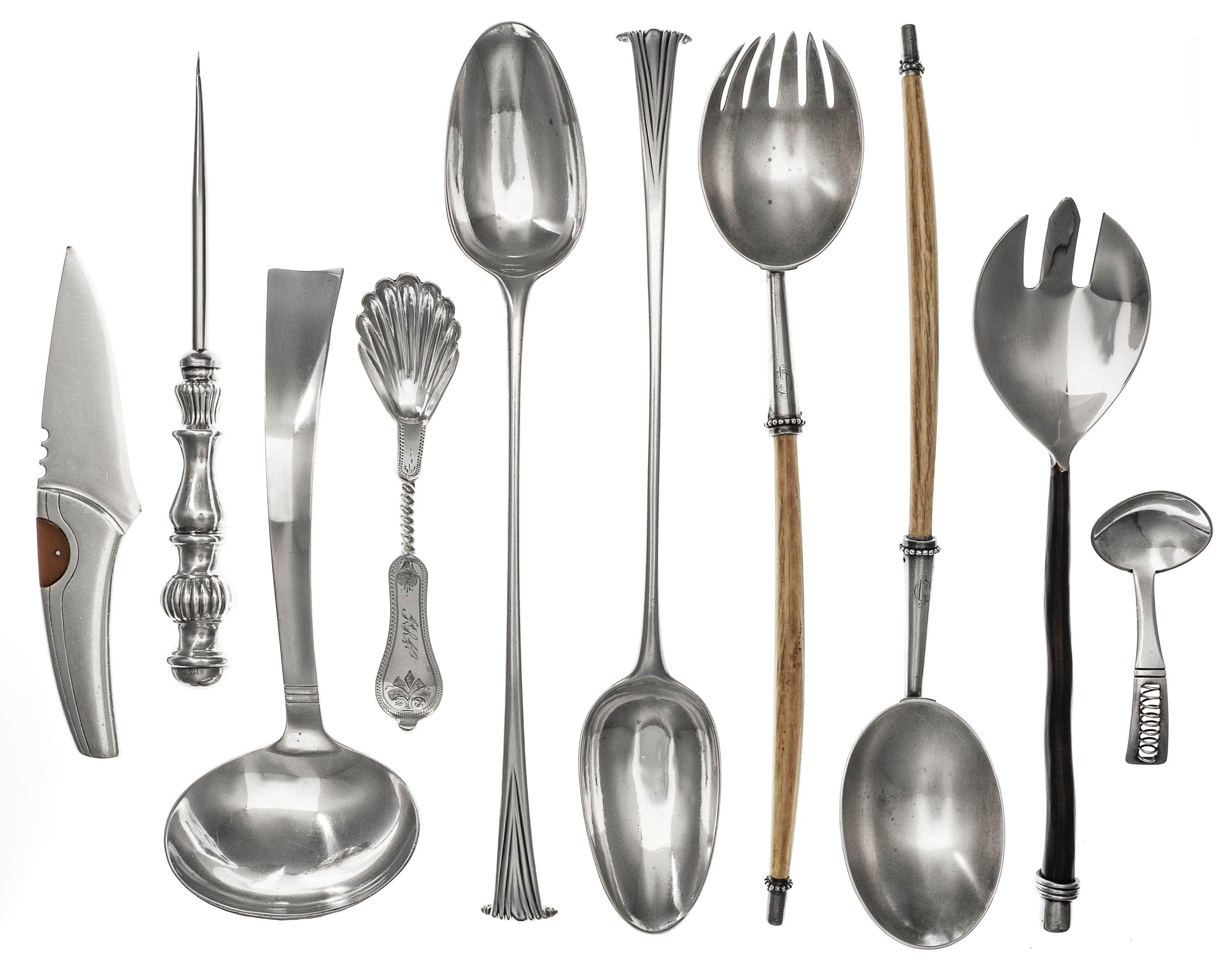 A Collection of Silver and Silver Plate Serving Articles, various makers, comprising two Georgian silver Onslow pattern serving spoons,
