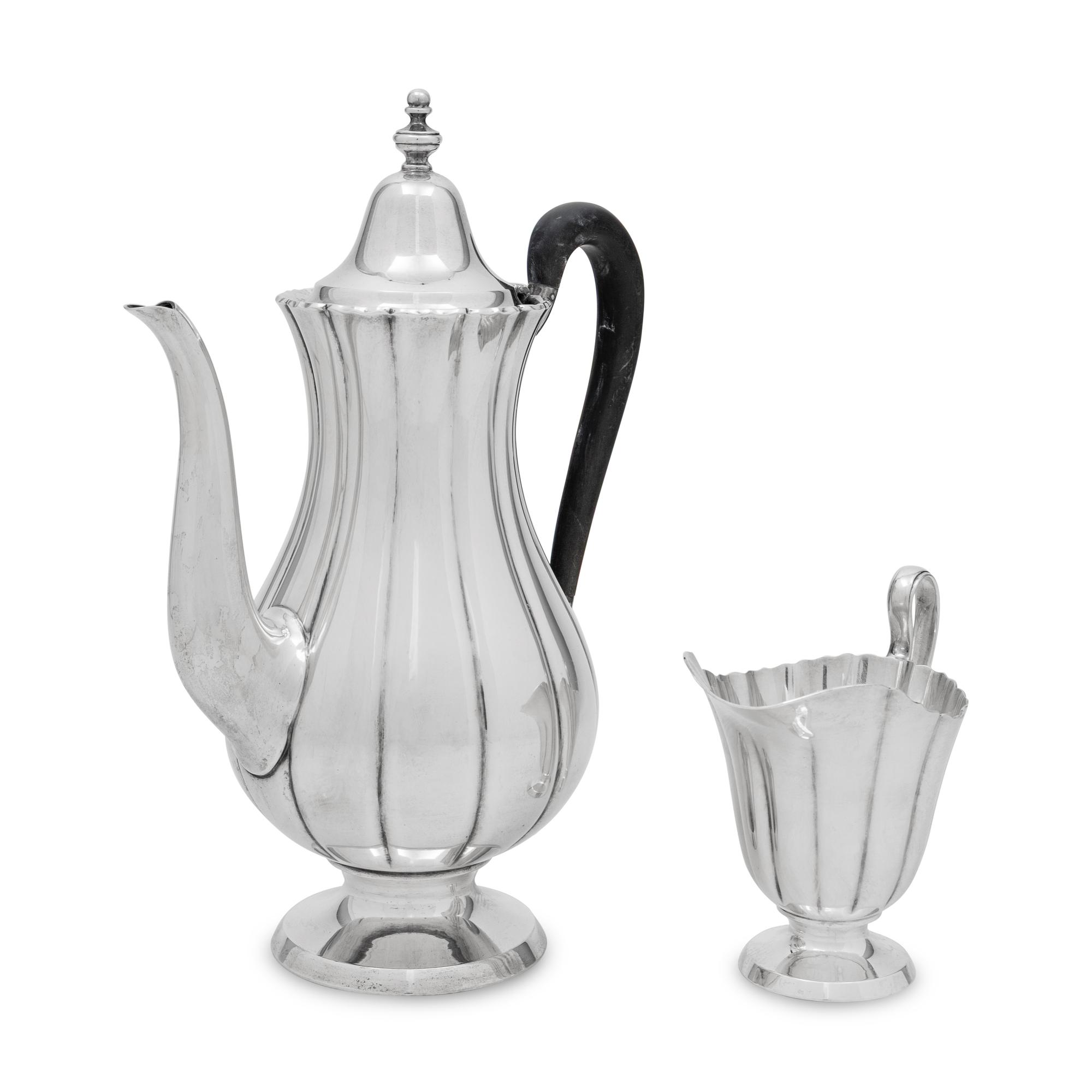 An American Silver Coffee Pot and Creamer