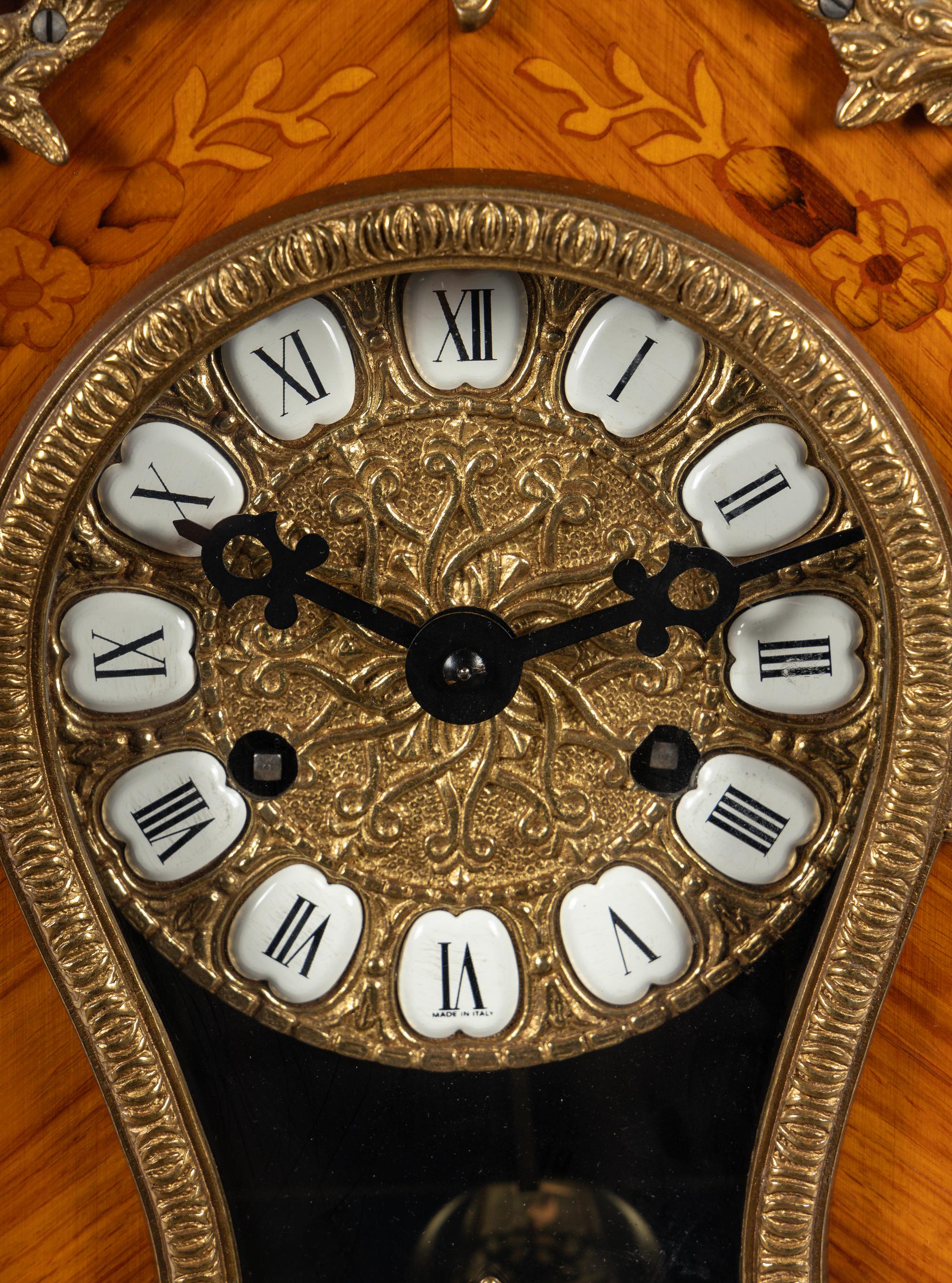 A Napoleon III Style Gilt Metal Mounted Marquetry Bracket Clock
