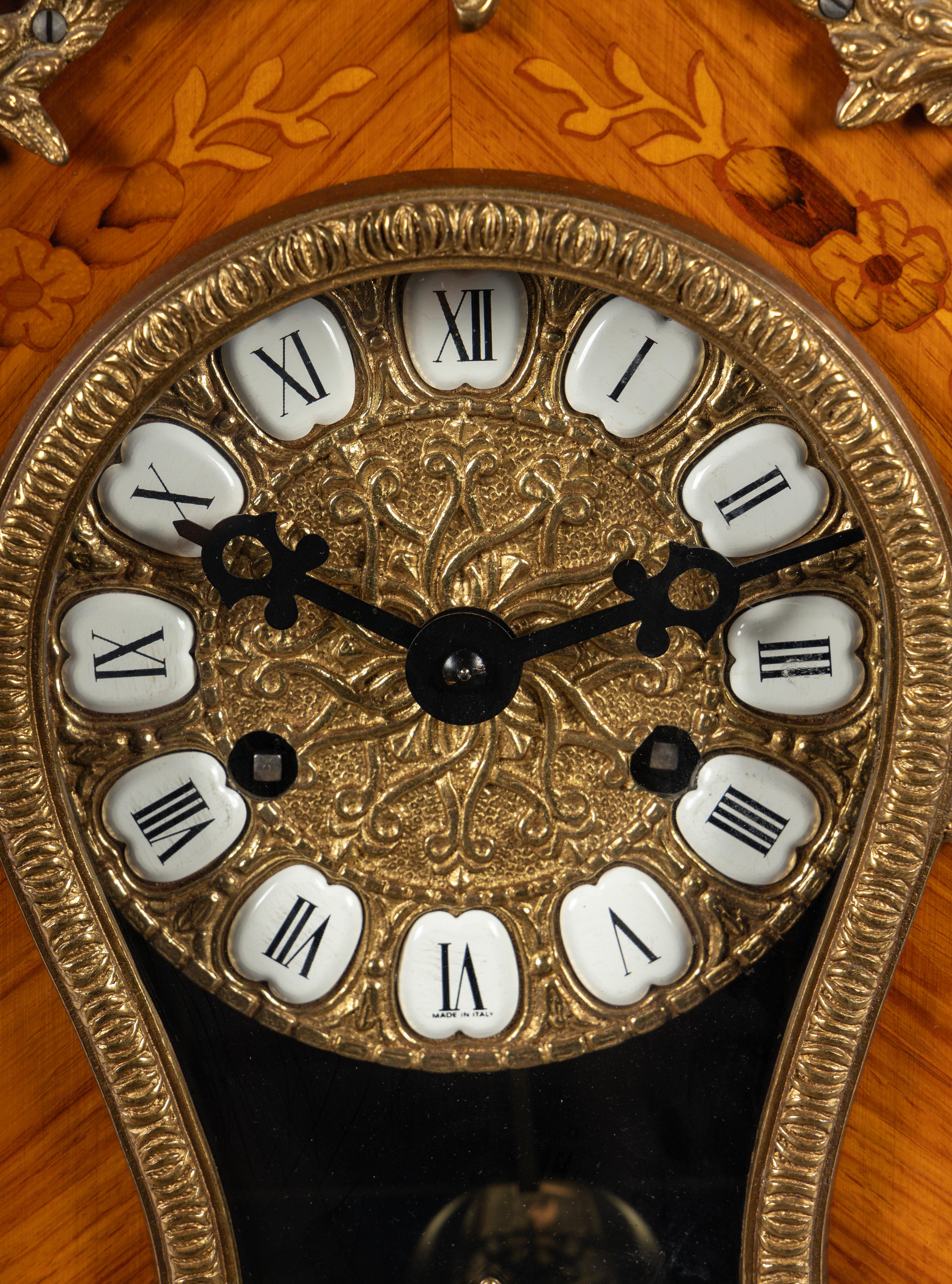 A Napoleon III Style Gilt Metal Mounted Marquetry Bracket Clock