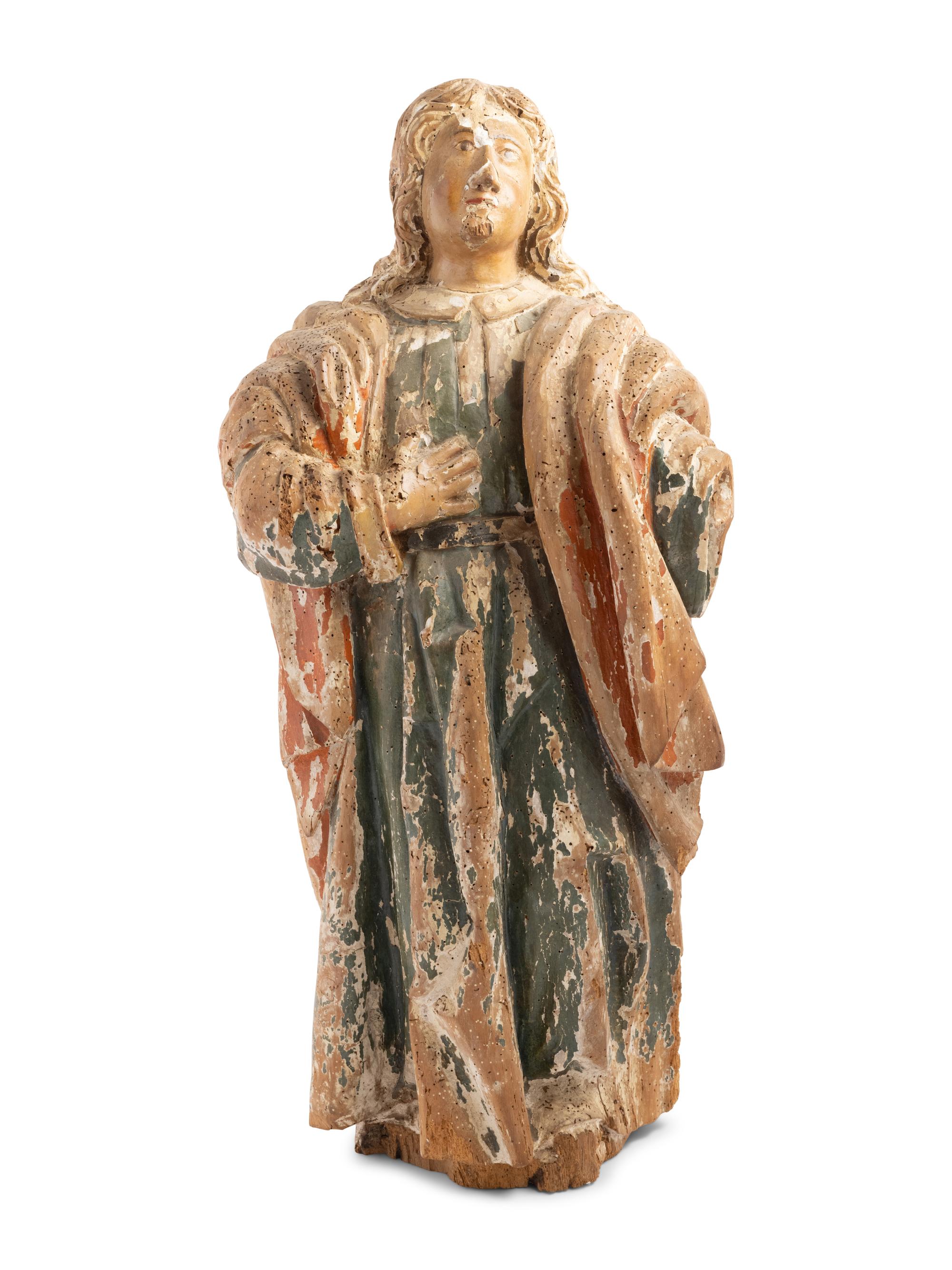 A Continental Carved and Painted Figure of a Saint