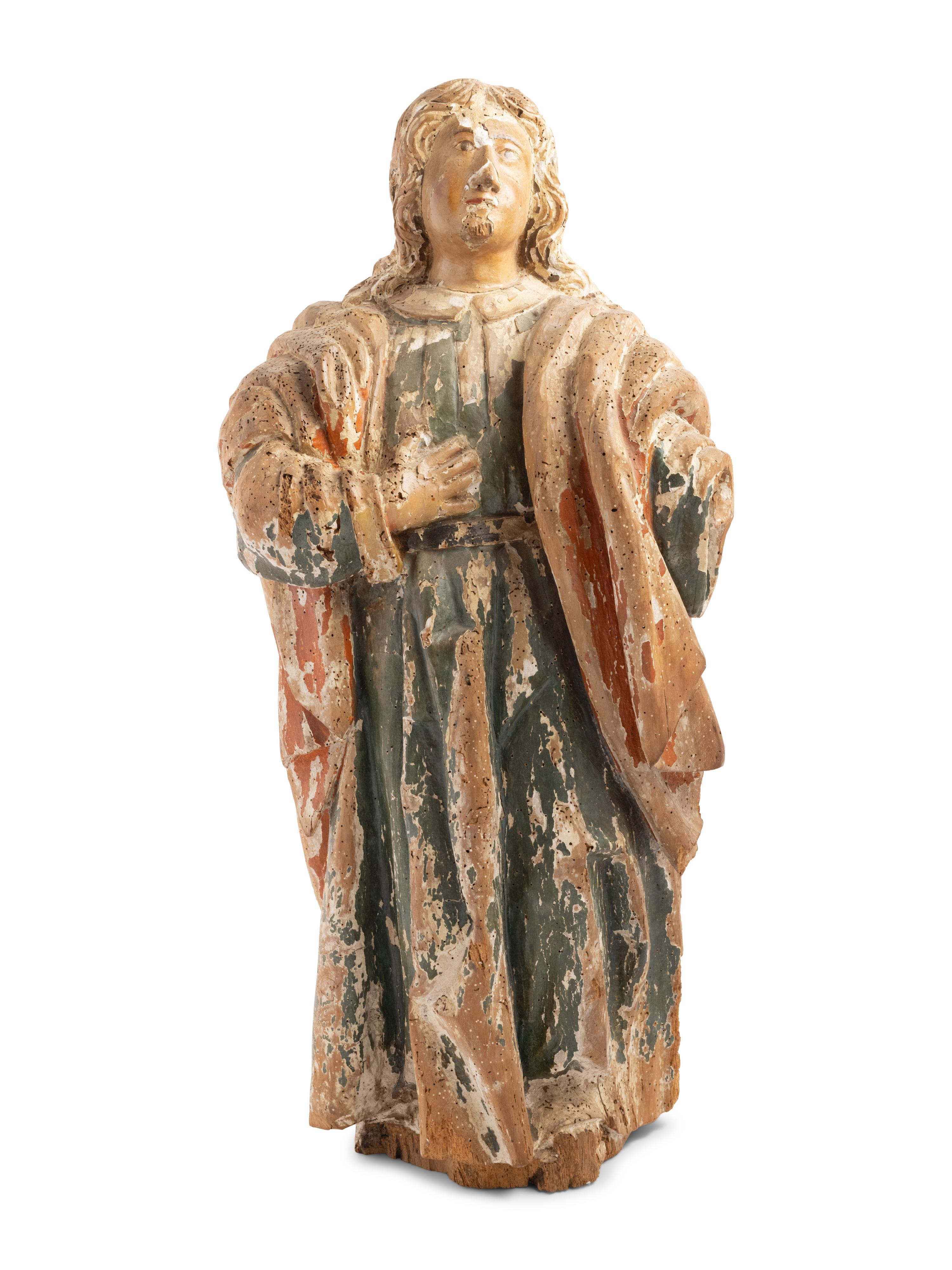A Continental Carved and Painted Figure of a Saint