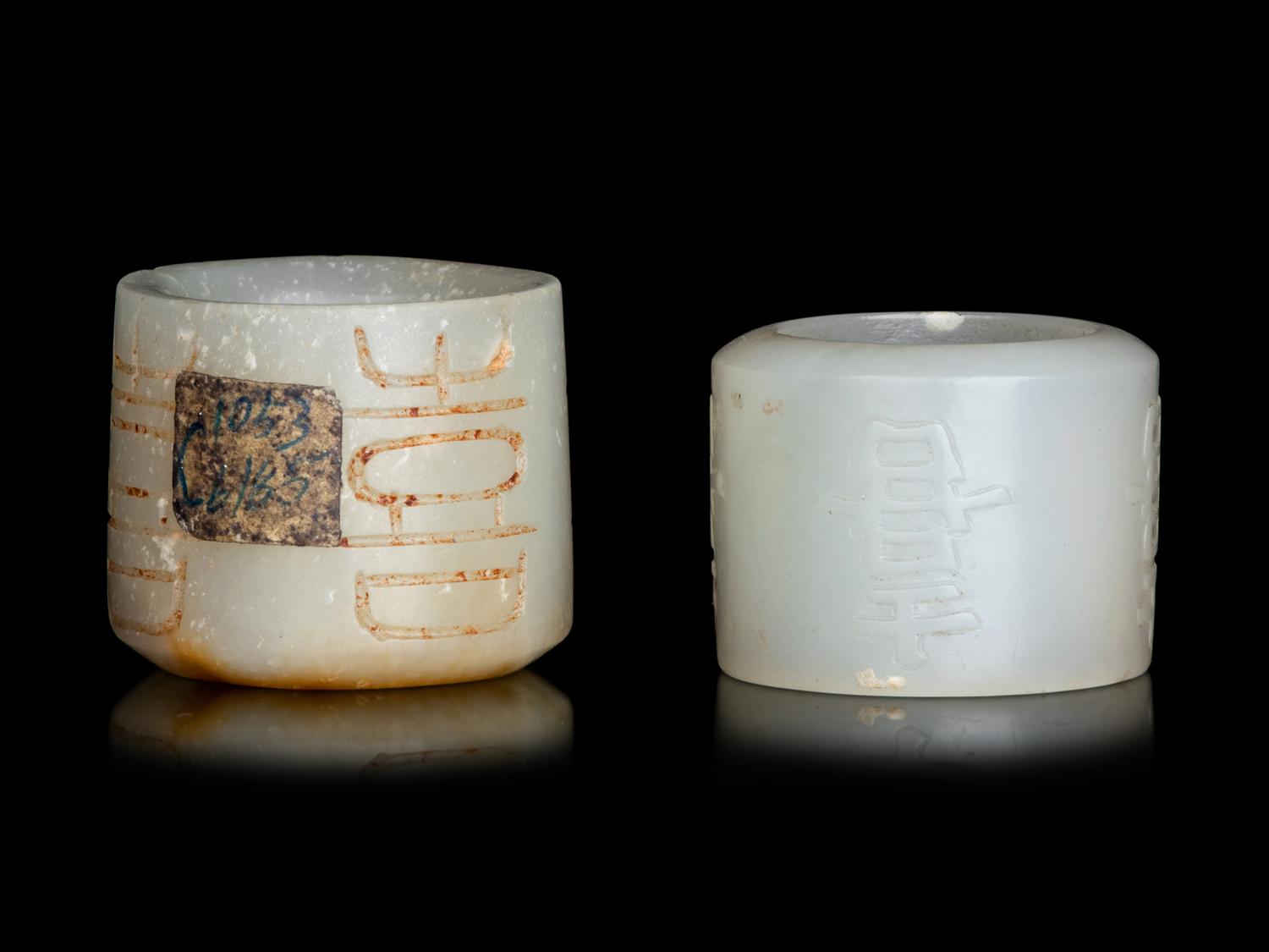 Two White Jade 'Happiness' Archer's Rings