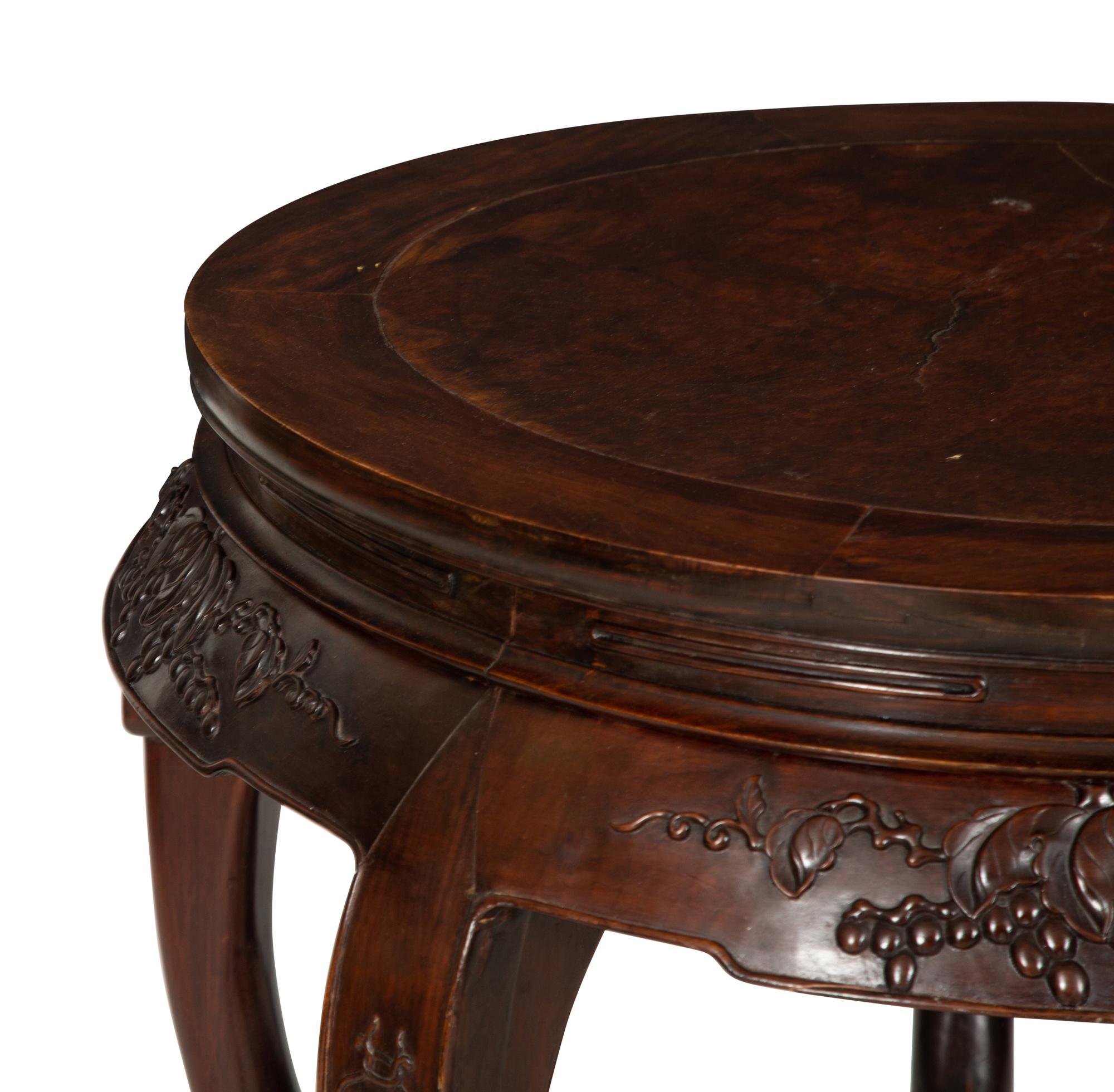 A Chinese Carved Hardwood Center Table and Four Matching Low Stools/Pedestals
