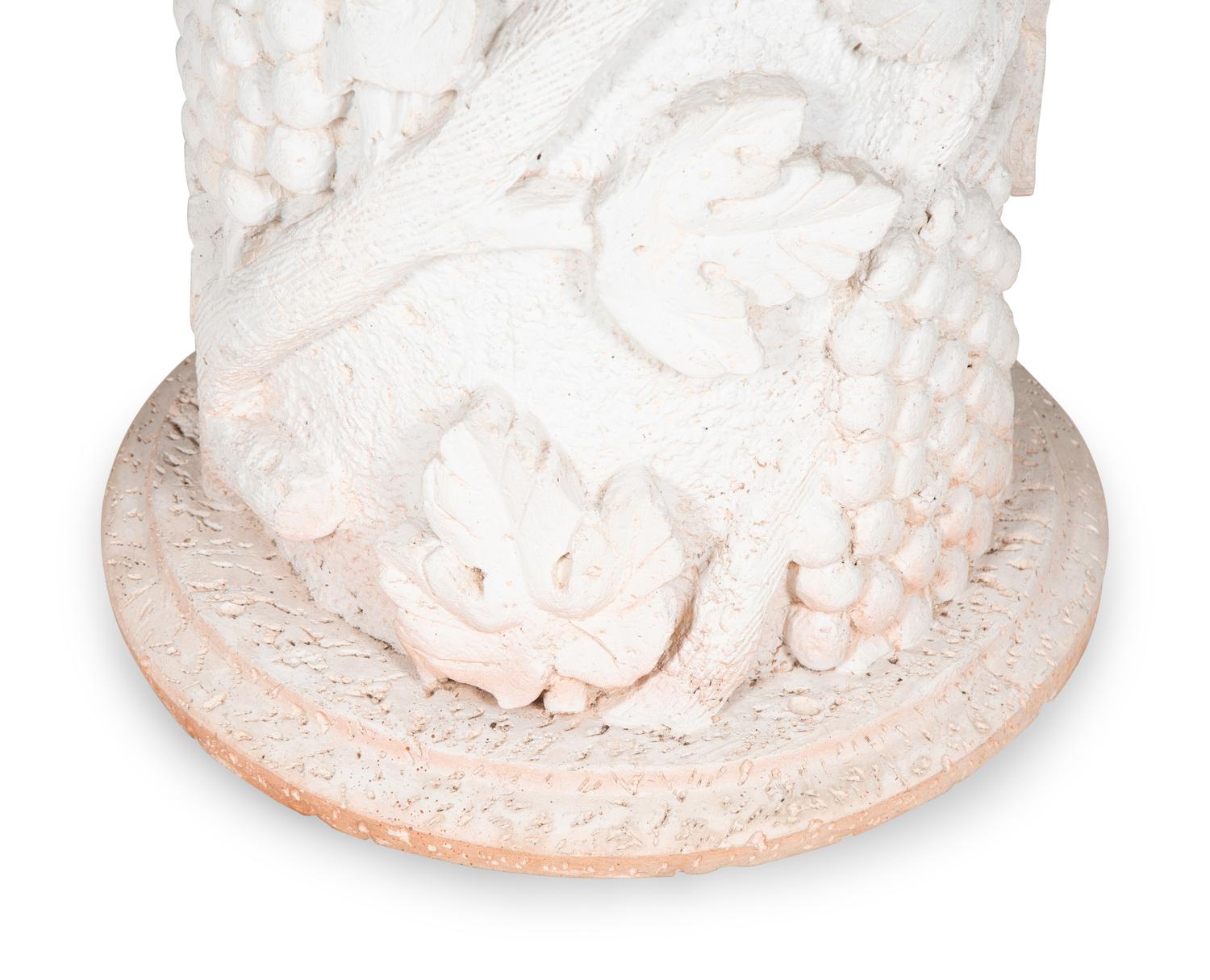 A Cast Stone and Pietra Dura Circular Dining Table