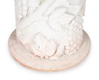 A Cast Stone and Pietra Dura Circular Dining Table