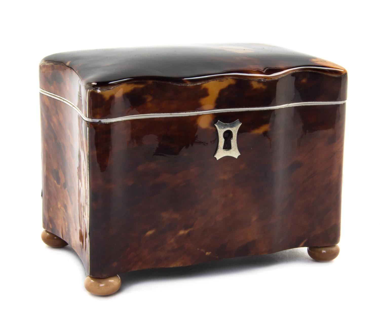 An English Tortoise Shell Tea Caddy, Height 3 3/4 x width 4 1/2 x depth 3 inches.