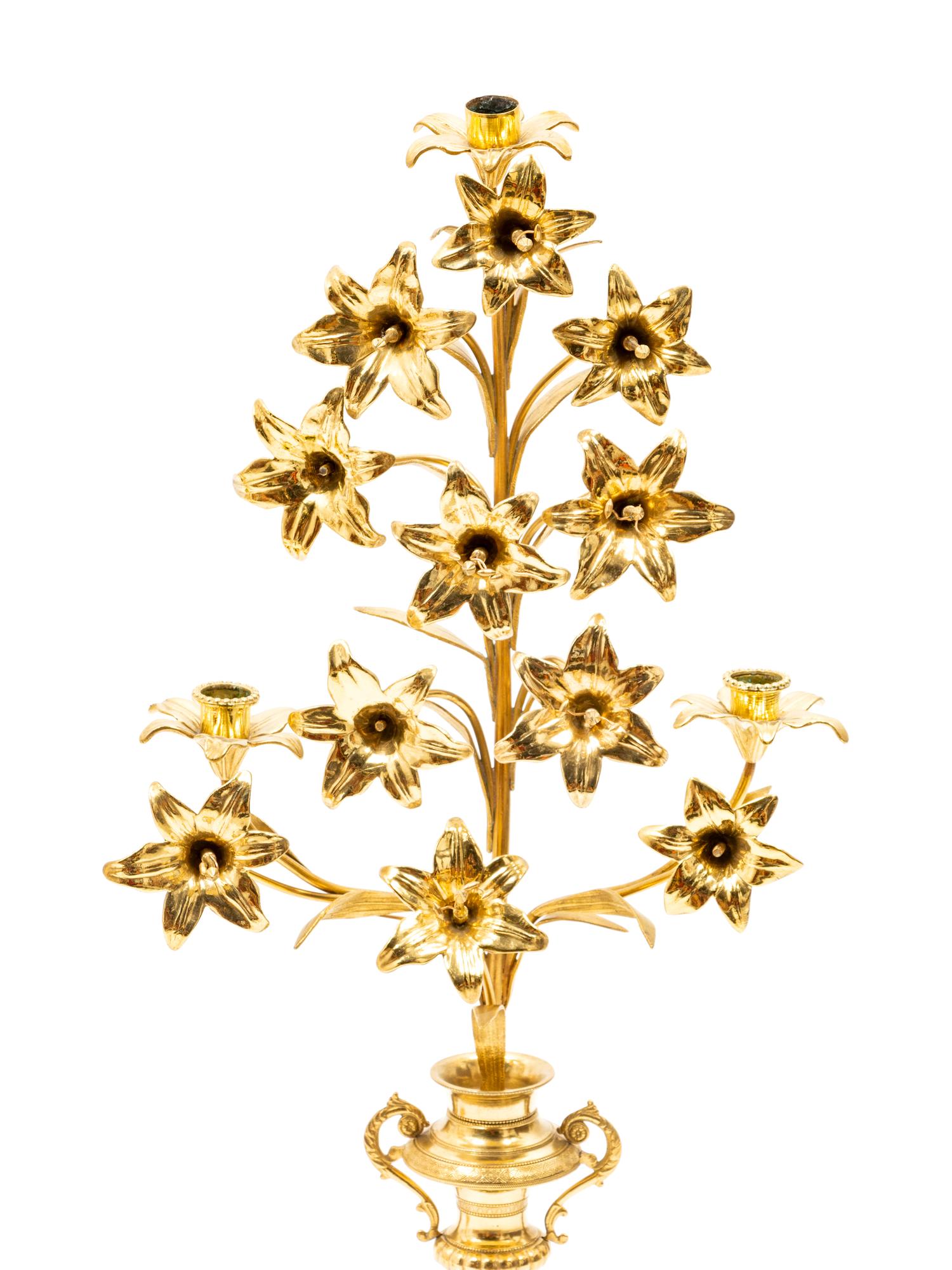 A Pair of Gilt Metal Three Light Candelabras
