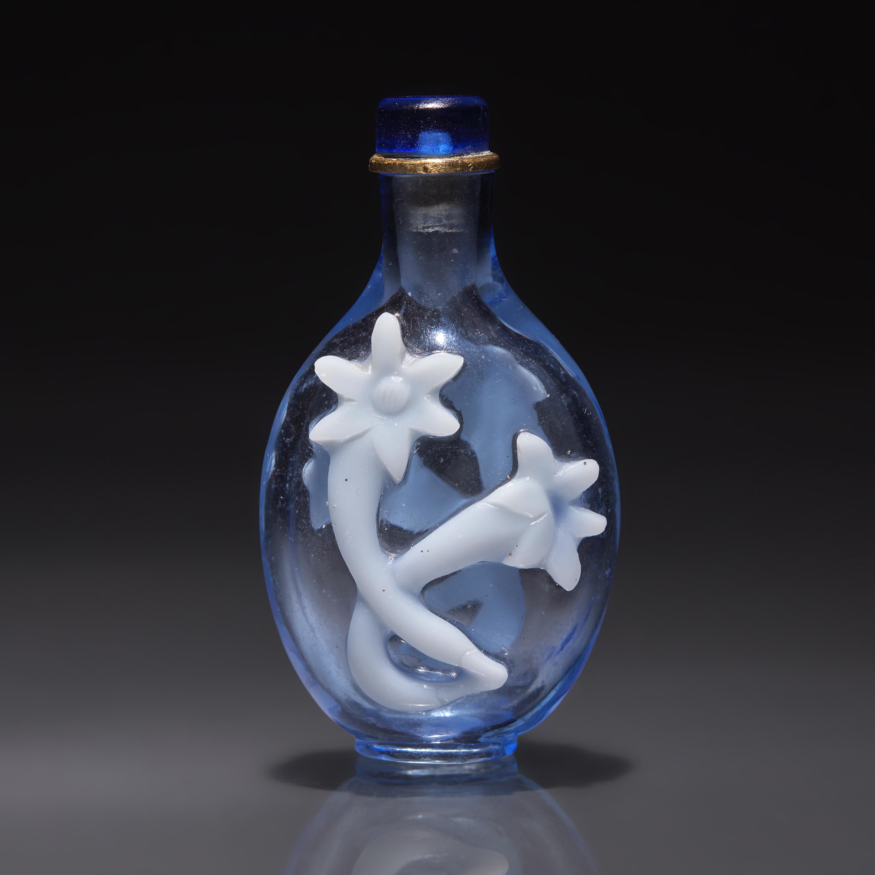 An Imperial Chinese Overlay Glass Snuff Bottle, Qing Dynasty, 18th Century — 清中期 御製淡藍地套白料龍膽花鼻煙壺