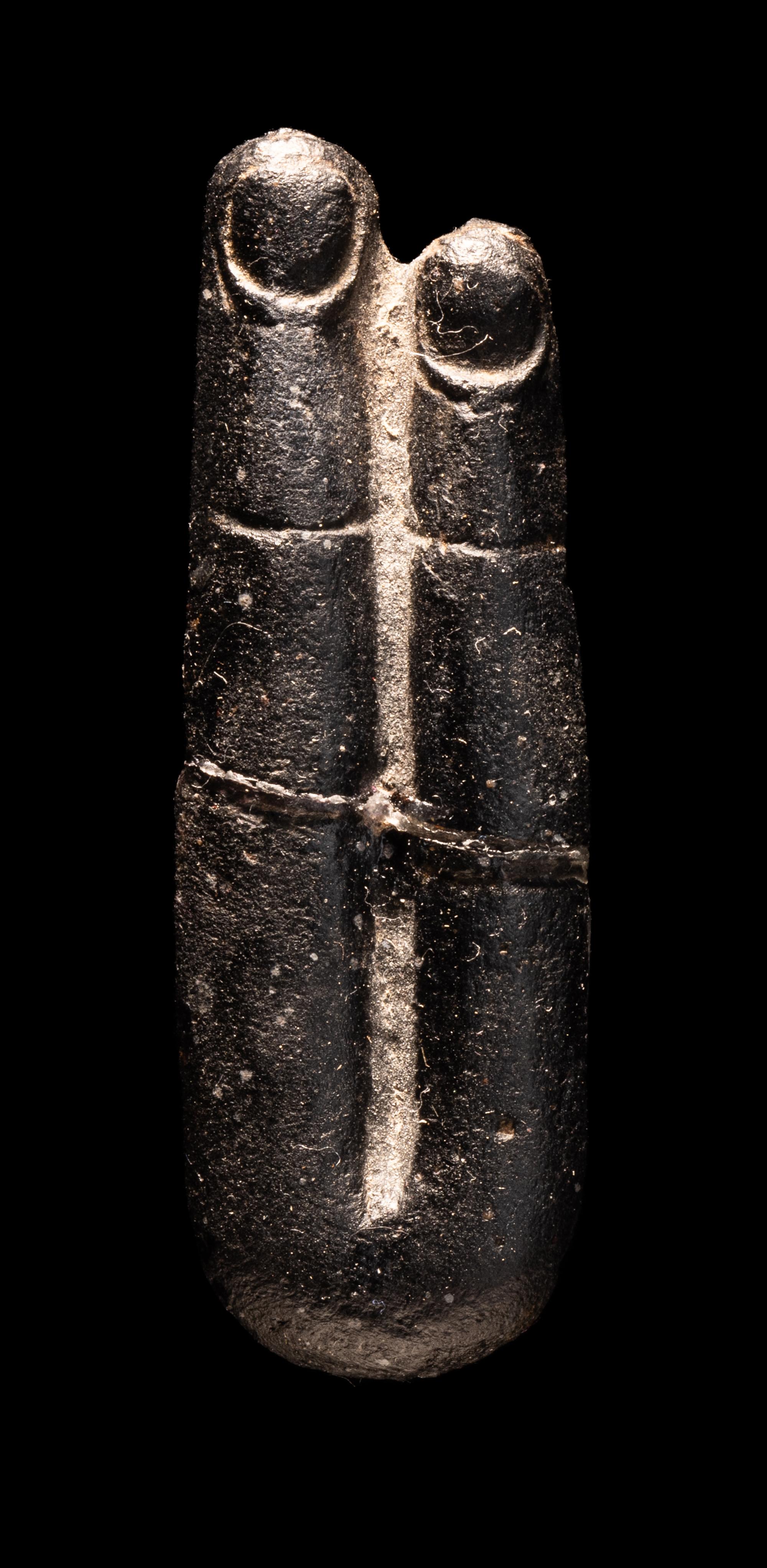 An Egyptian Stone Two-Finger Amulet