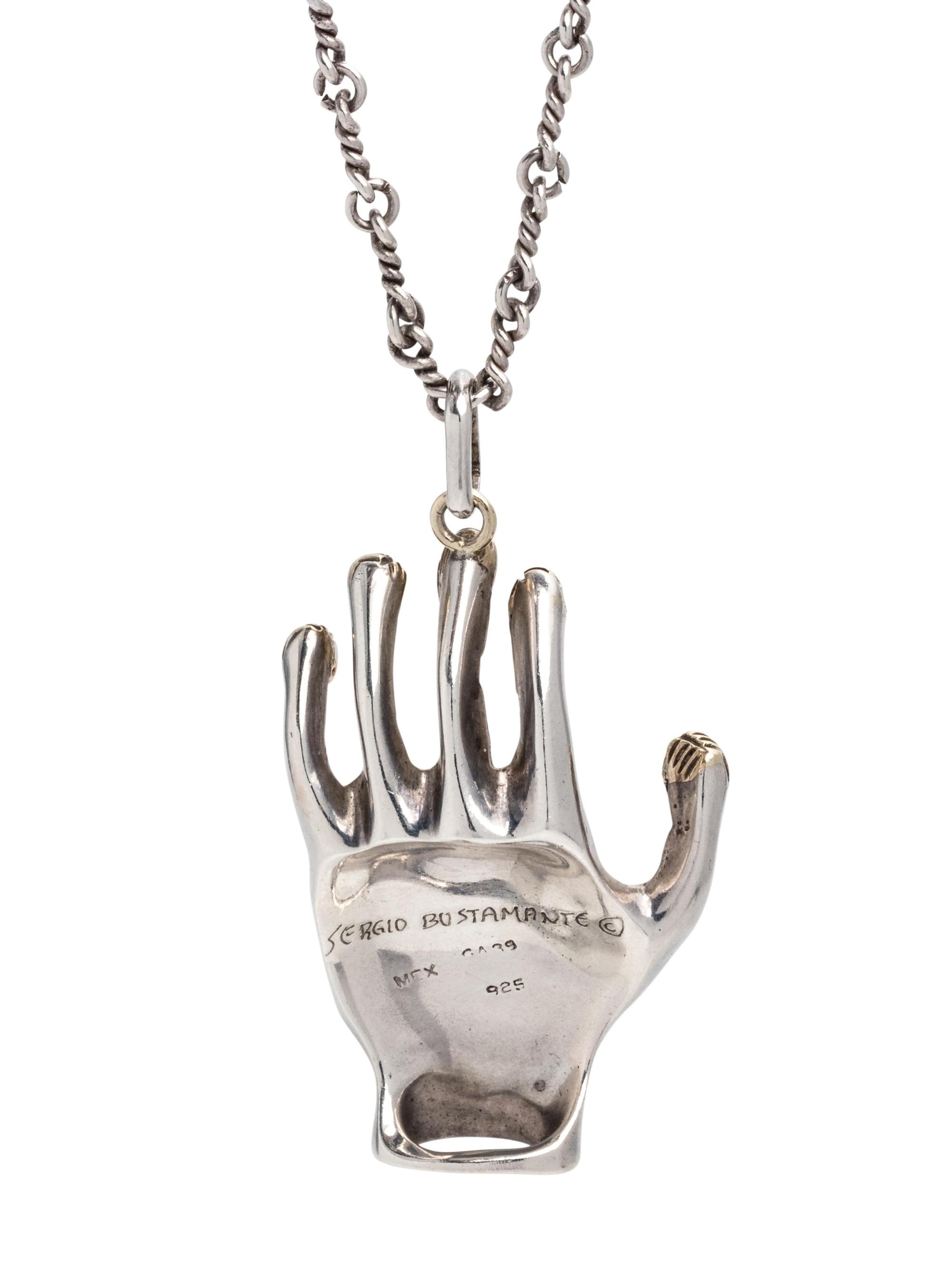 SERGIO BUSTAMANTE, STERLING SILVER PENDANT/NECKLACE