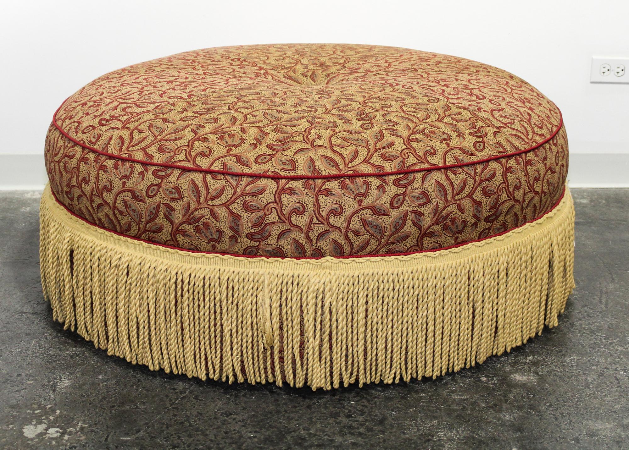 An Upholstered Ottoman Diameter 41 1/2 inches. — 20TH CENTURY