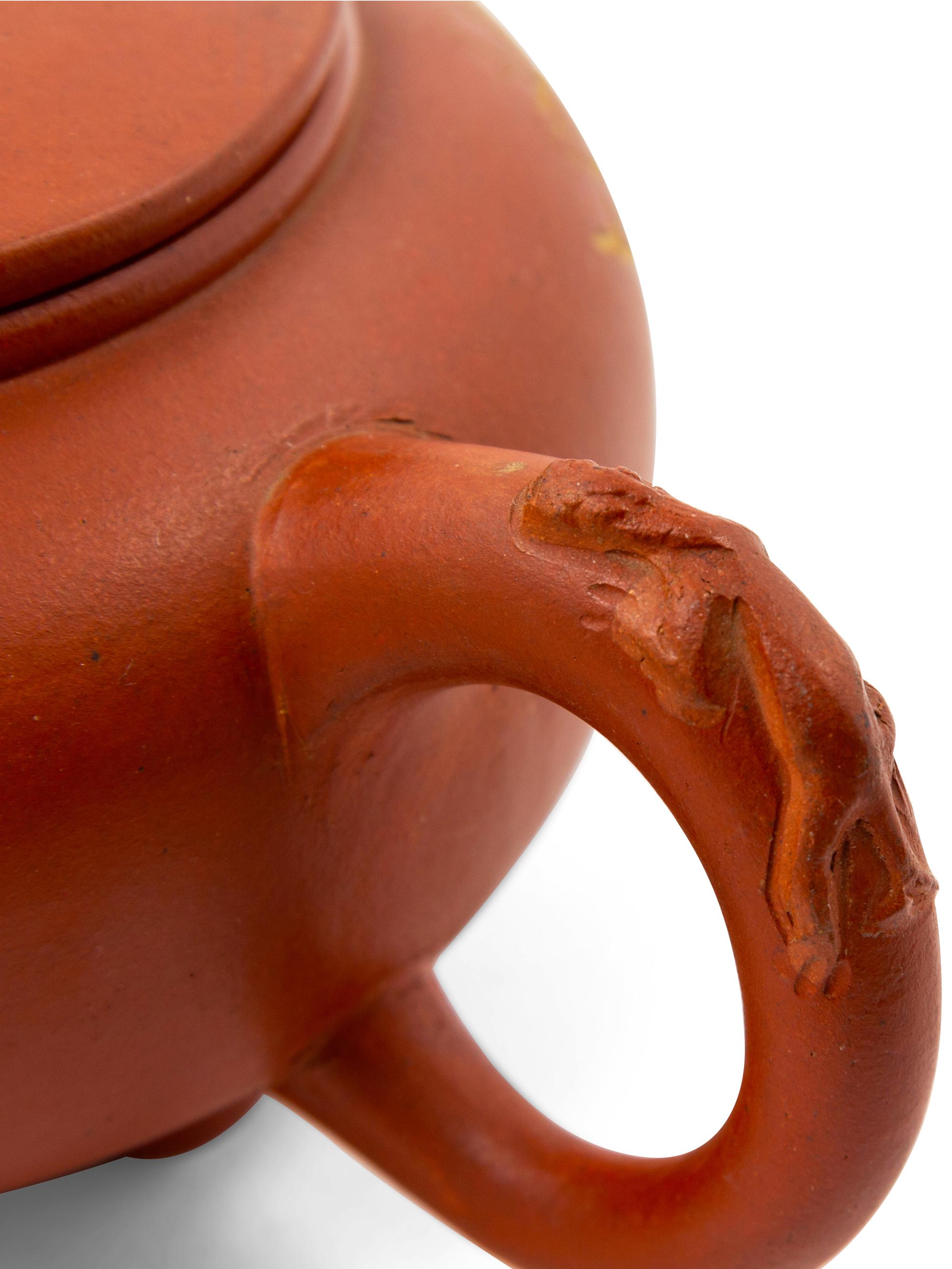 A Chinese Yixing Pottery Teapot