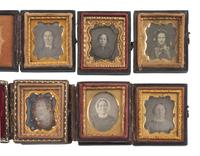[EARLY PHOTOGRAPHY]. 74 sixteenth plate daguerreotypes of men, women, & children of varying ages.