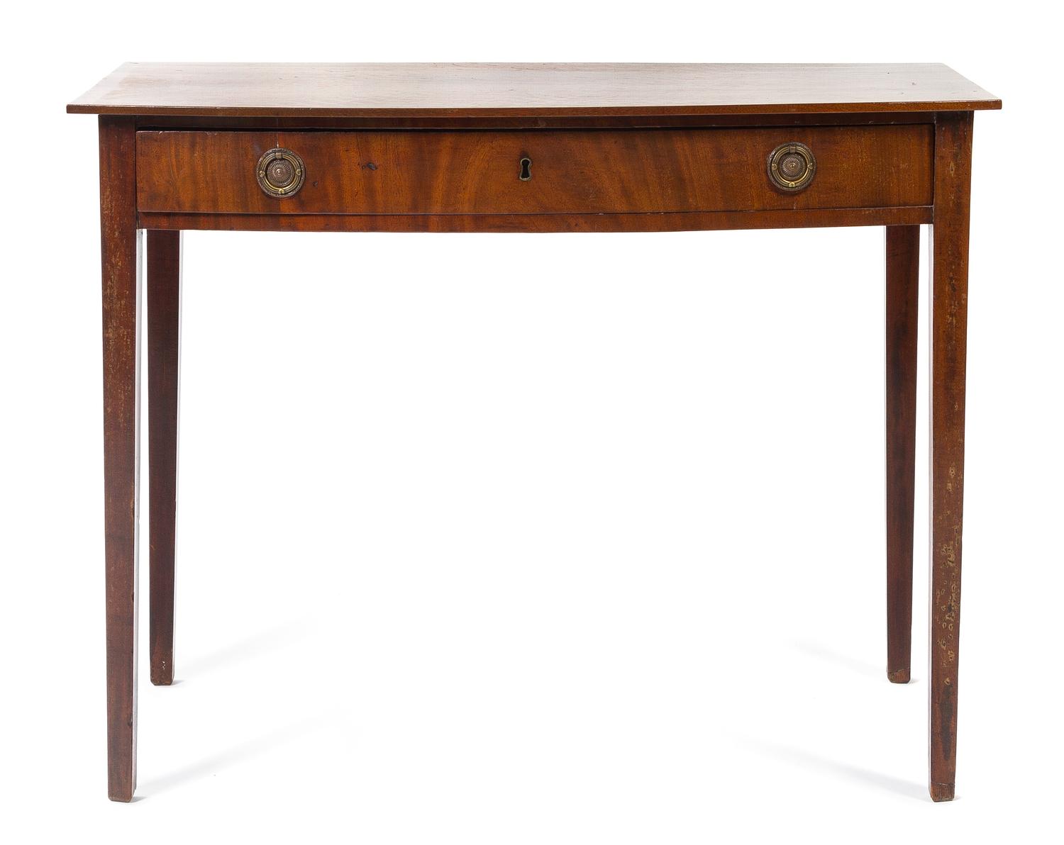 A George III Mahogany Writing Table Height 29 x width 37 3/4 x depth 20 3/4 inches. — EARLY 19TH CENTURY