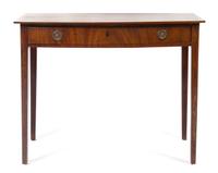 A George III Mahogany Writing Table Height 29 x width 37 3/4 x depth 20 3/4 inches. — EARLY 19TH CENTURY