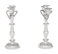 A Pair of American Silver Repoussé Three-Light Candelabra