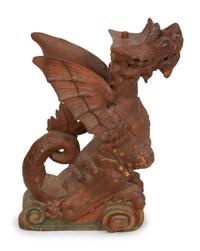 An Italian Carved and Polychromed Seated Dragon