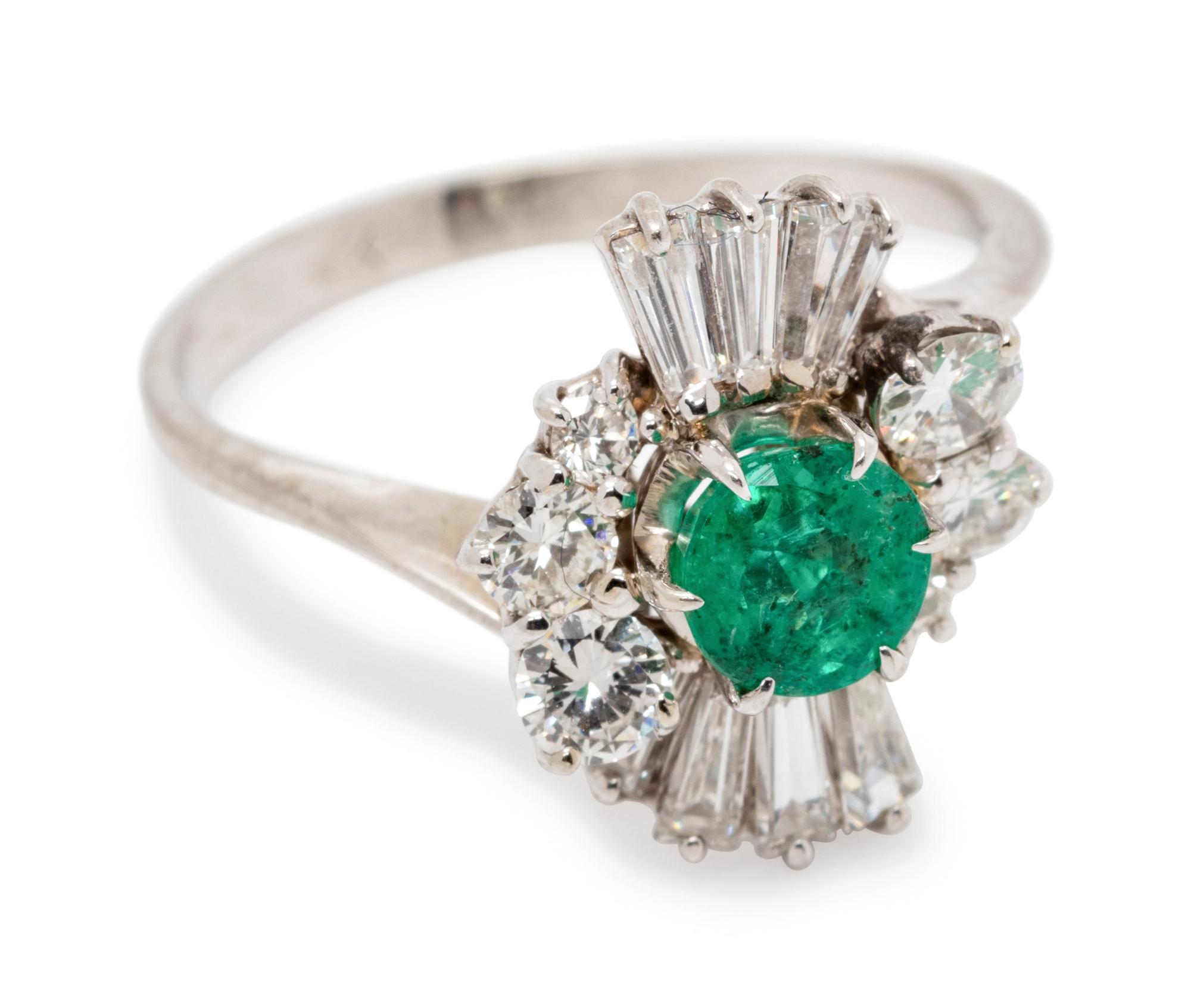 A White Gold, Emerald and Diamond Ring,