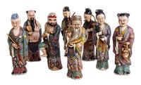 A Group of Eight Chinese Enameled Porcelain Immortal Figures Height of tallest 10 1/4 inches. — 20TH CENTURY