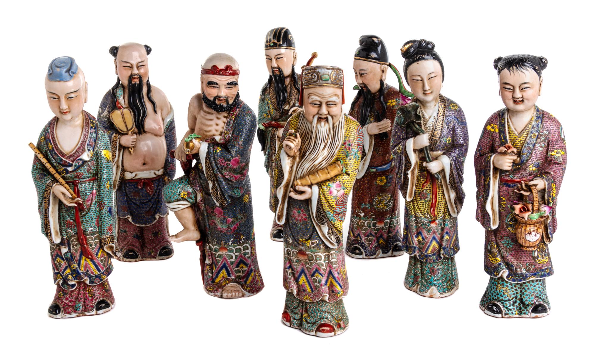 A Group of Eight Chinese Enameled Porcelain Immortal Figures Height of tallest 10 1/4 inches. — 20TH CENTURY