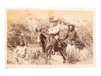 [NATIVE AMERICANS]. [BAKER & JOHNSTON, photographers]. General George Crook on muleback, with Chiricahua Apache scout Ba-Keitz-Ogie and White Mountain Apache scout Alchesay. [Colorado]: ca 1885.
