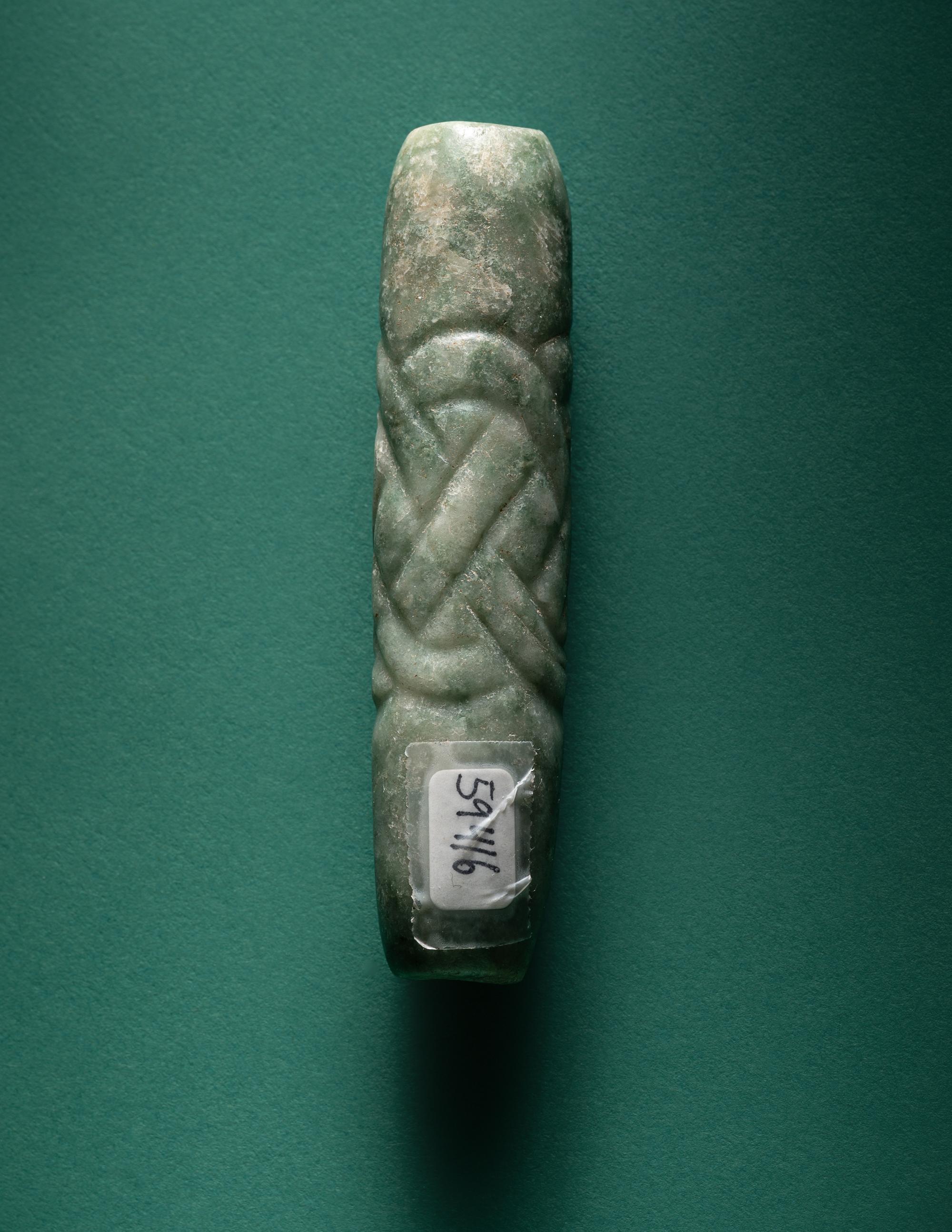 A Maya Jade Glyph Pendant