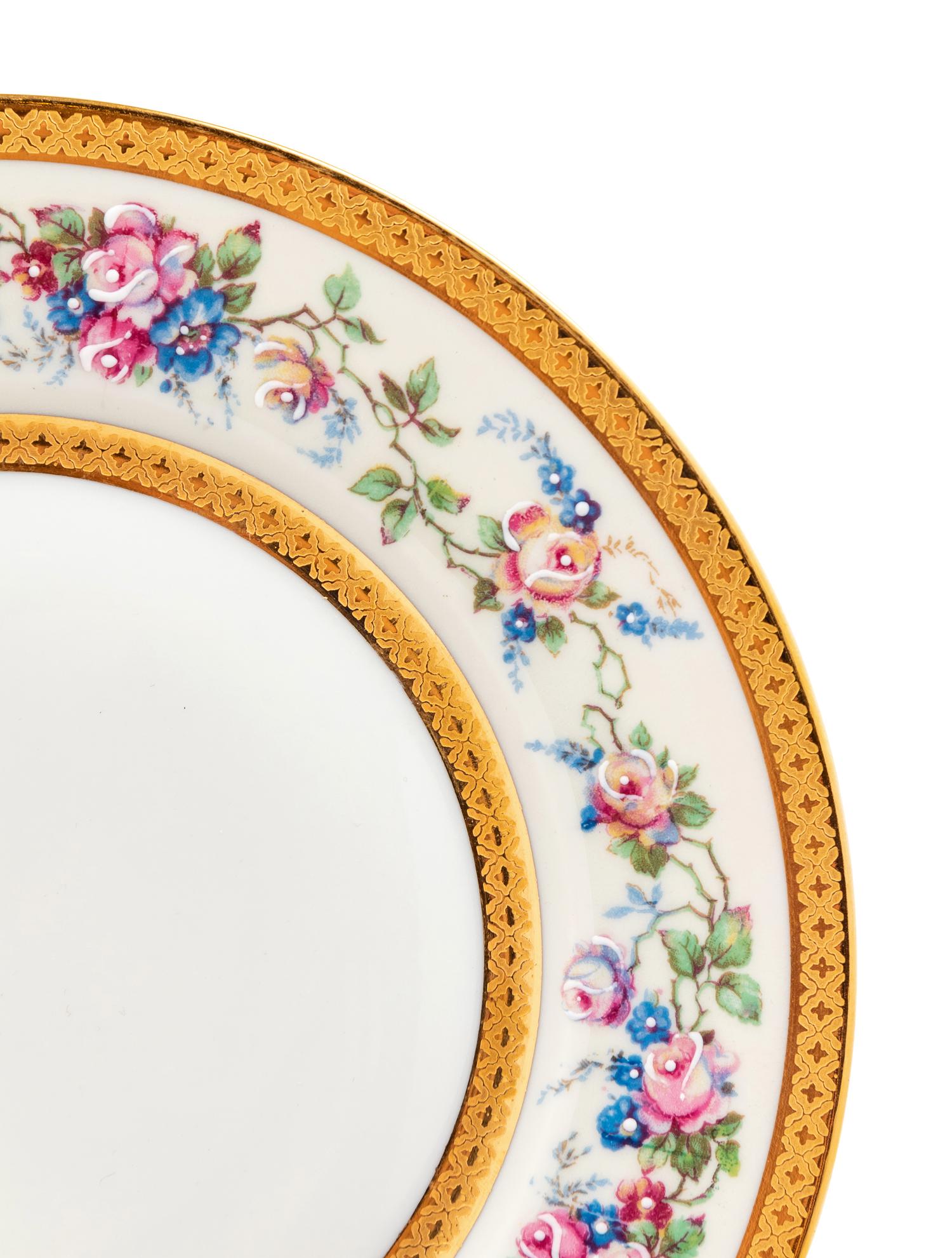 A Set of Limoges Porcelain Plates