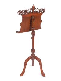 An Art Nouveau Style Carved Walnut Music Stand