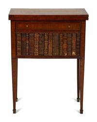 A Directoire Style Mahogany and Rosewood Small Cabinet with Faux-Leather Book Doors