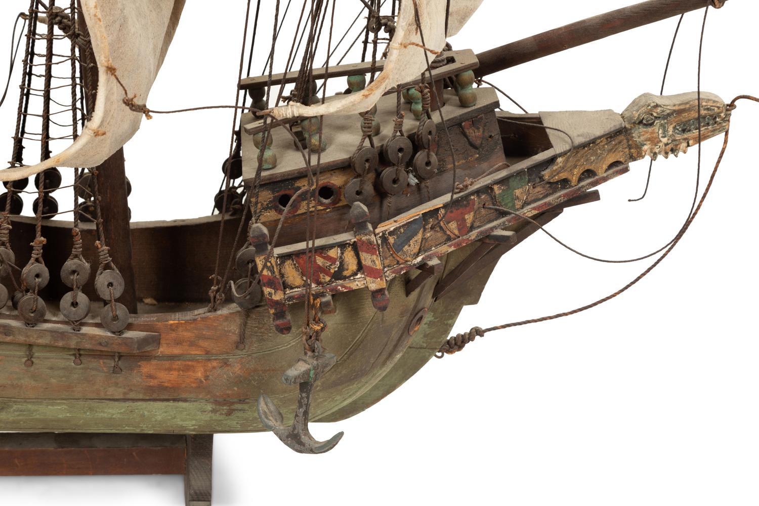 An Italian Painted and Parcel Gilt Model of a Galleon with Painted Cotton Sails
