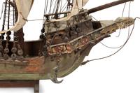 An Italian Painted and Parcel Gilt Model of a Galleon with Painted Cotton Sails
