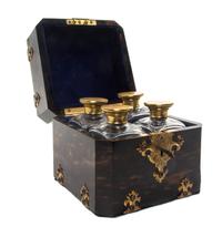 A French Brass and Porcelain Mounted Calamander Decanter Set, SECOND HALF 19TH CENTURY, Height 5 3/8 x width 5 3/4 inches. — SECOND HALF 19TH CENTURY,