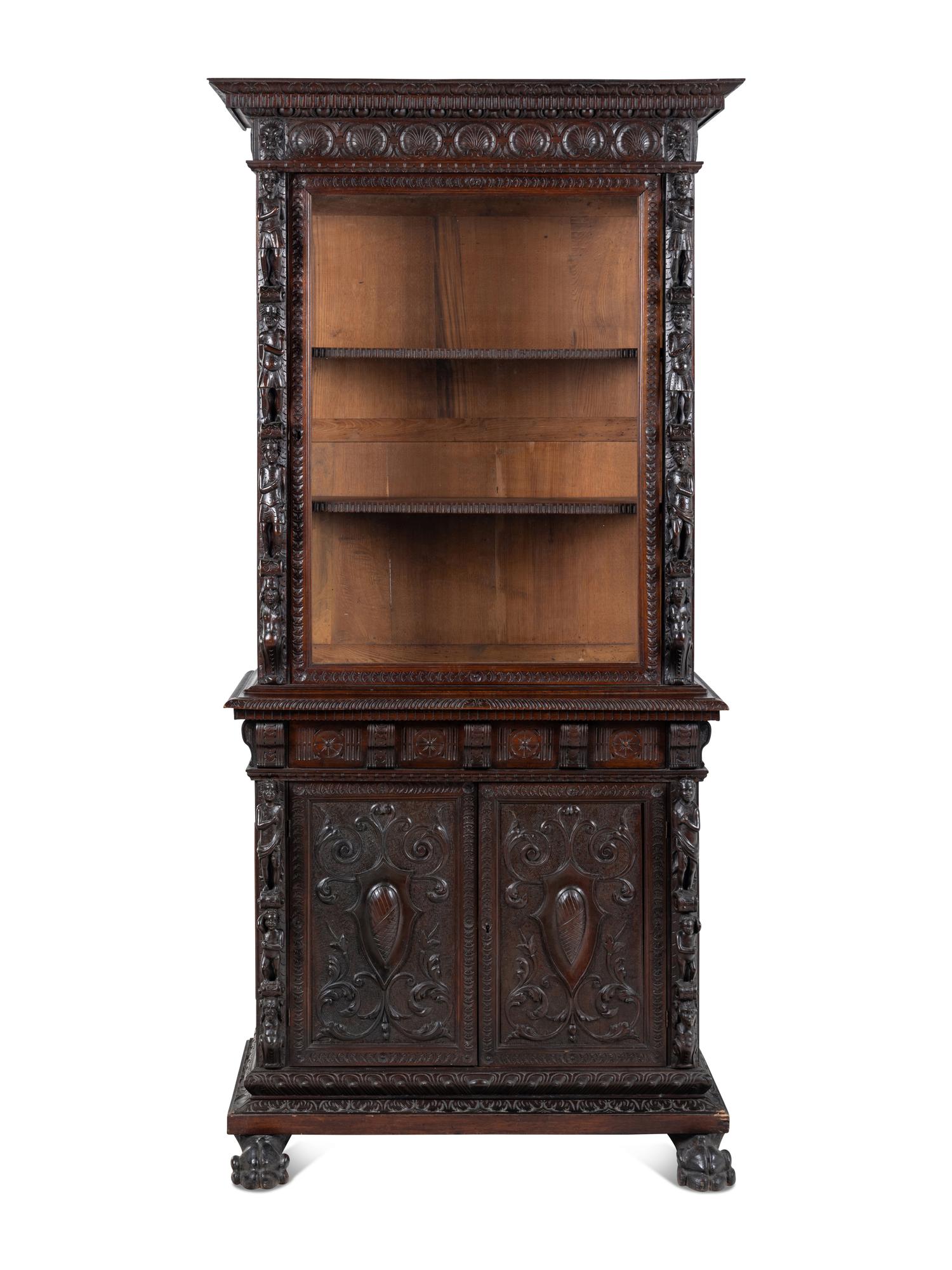 An Austrian Carved Walnut Cabinet