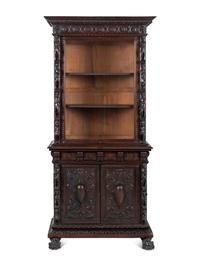 An Austrian Carved Walnut Cabinet