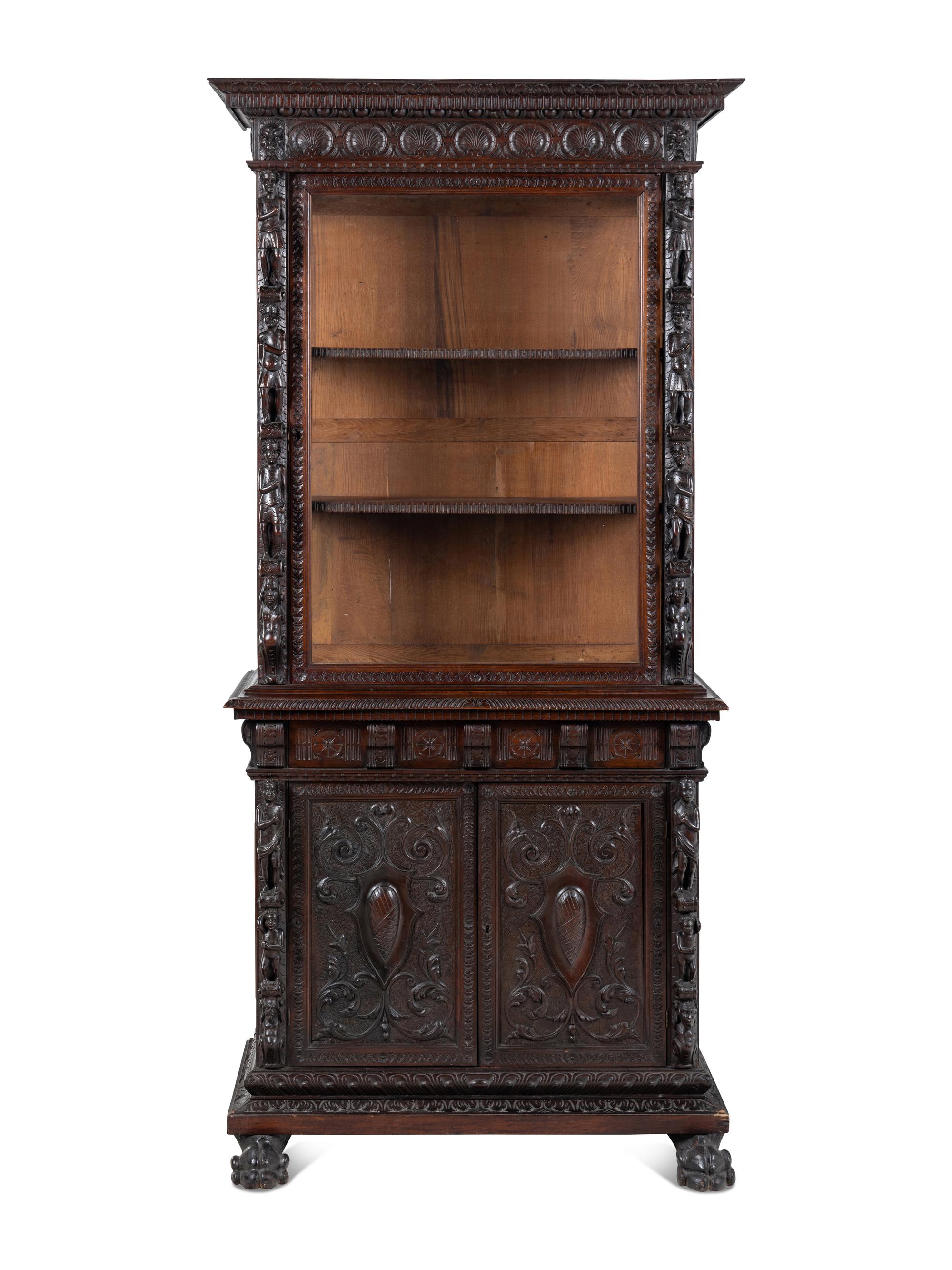 An Austrian Carved Walnut Cabinet