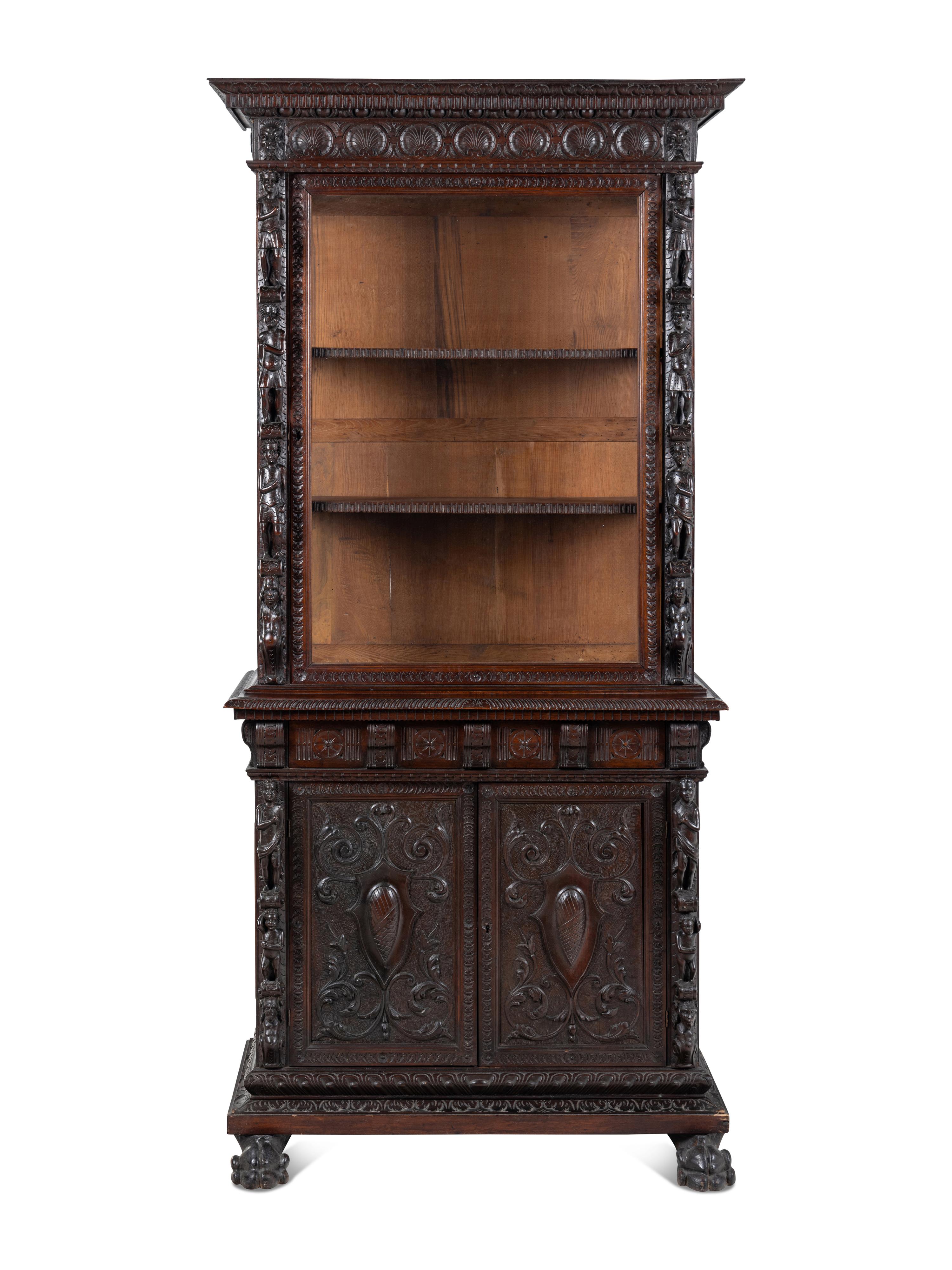 An Austrian Carved Walnut Cabinet