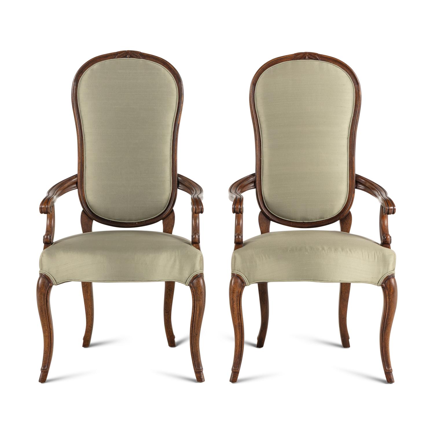 A Pair of Regence Style Walnut Fauteuils