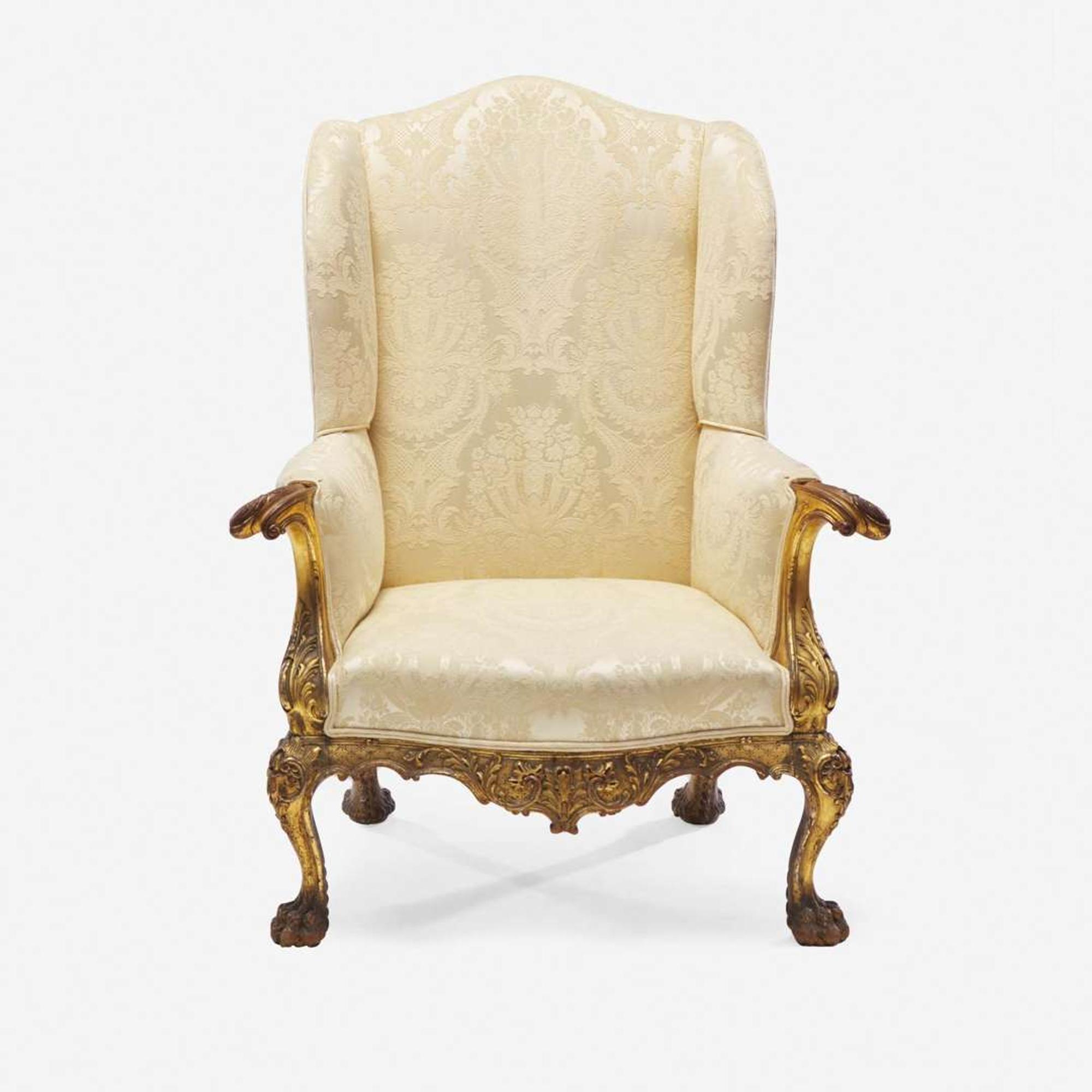 A Chippendale style carved and gilt open arm chair in the French manner American, circa 1875