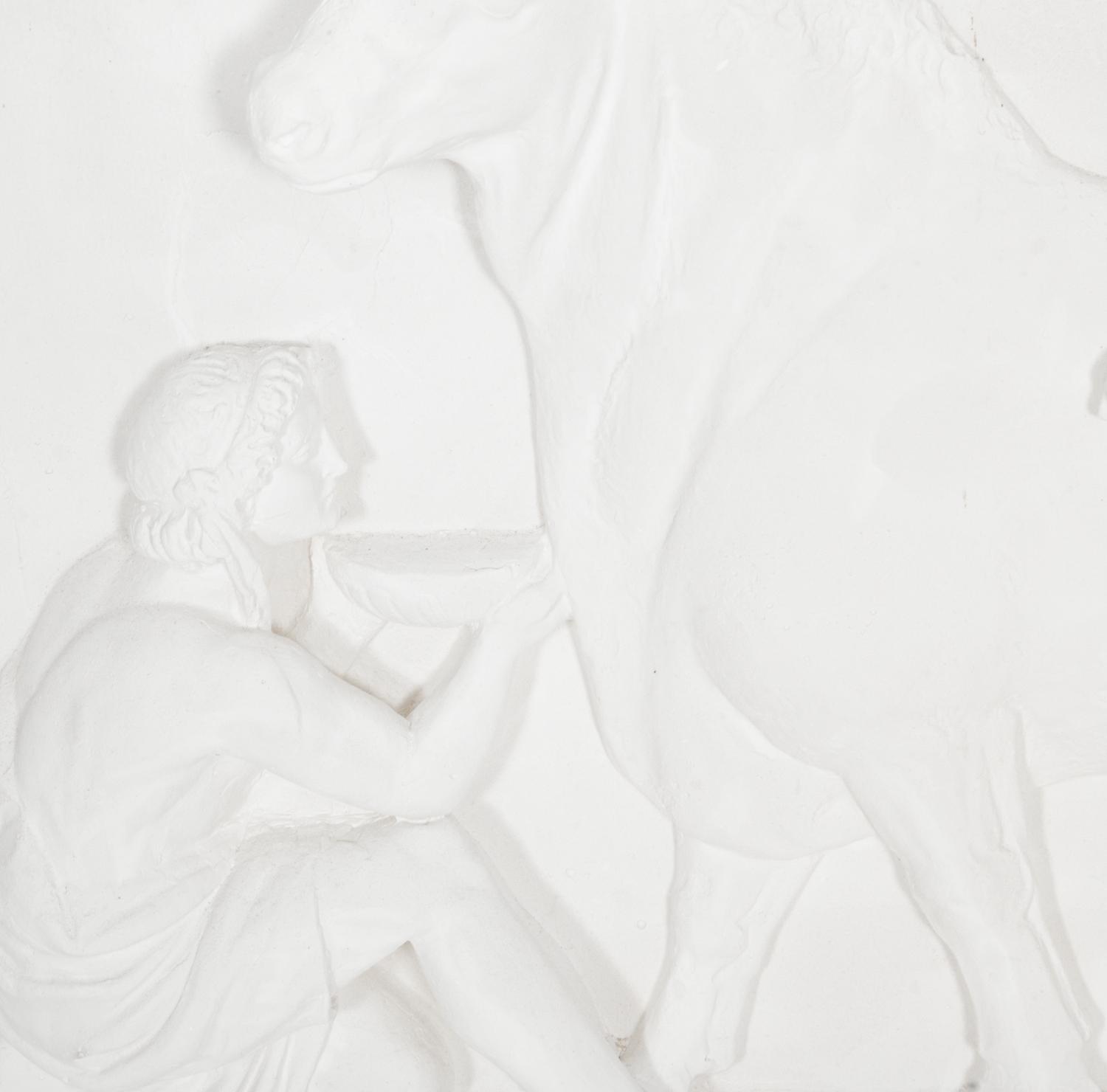 Two Cast Plaster Relief Panels After the Antique