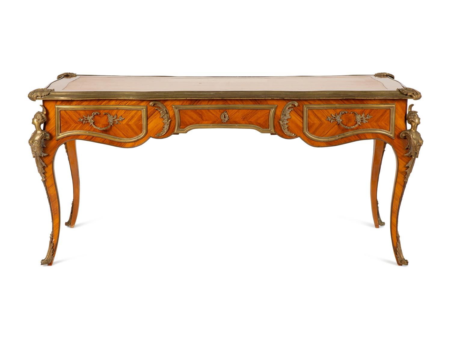 A Louis XV Style Gilt Bronze Mounted Tulipwood Bureau Plat
