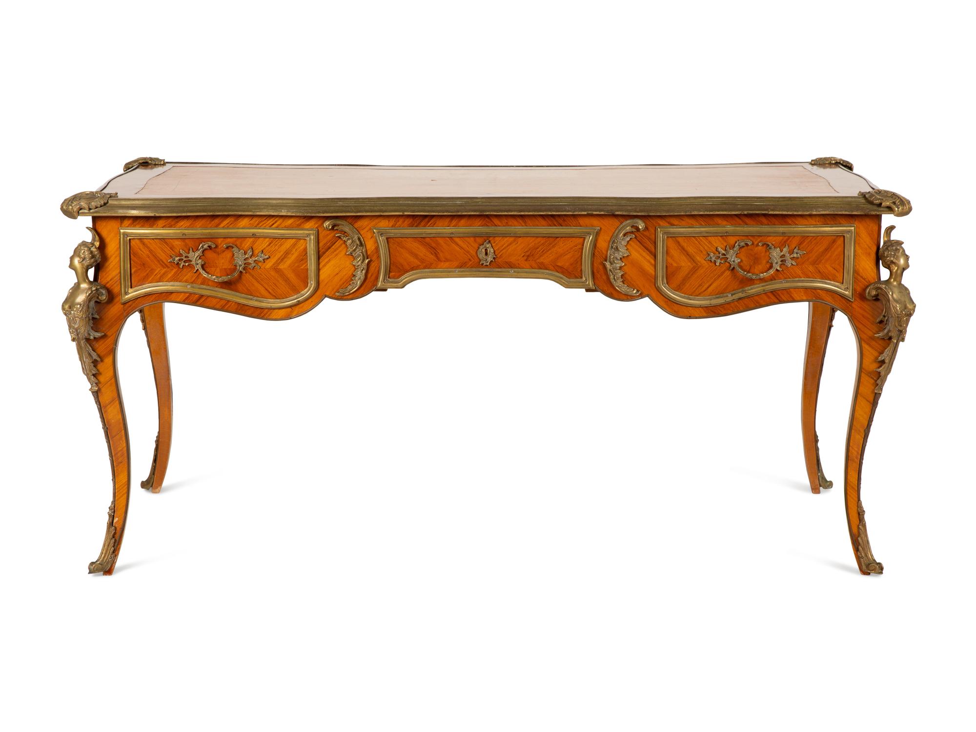 A Louis XV Style Gilt Bronze Mounted Tulipwood Bureau Plat